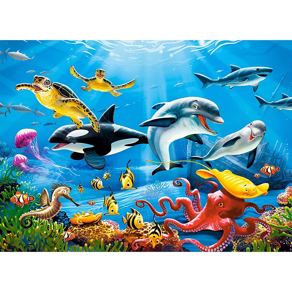 Escena submarina con delfines, tiburones, tortugas, peces y un pulpo en un océano azul.