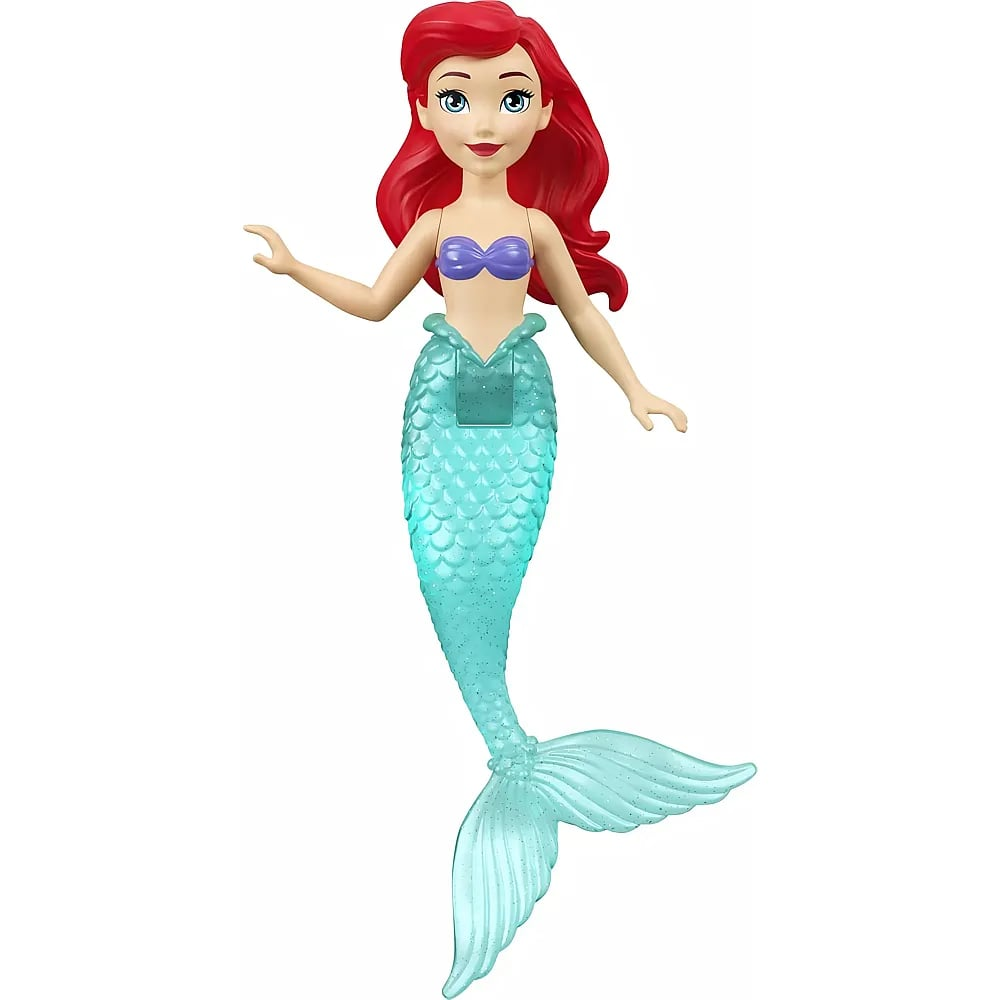 Una muñeca de la sirenita Ariel con cabello rojo, top morado y una cola turquesa brillante.