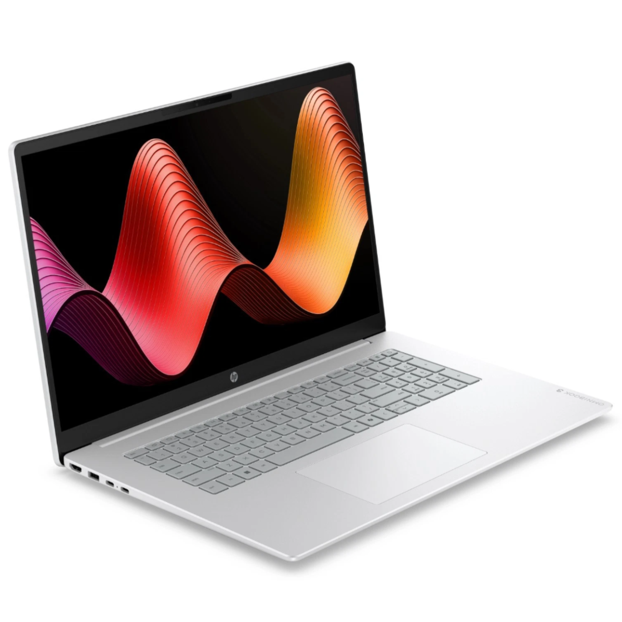 Ein silberner Laptop mit einem bunten Wellenmuster auf dem Bildschirm steht auf einer weißen Oberfläche.