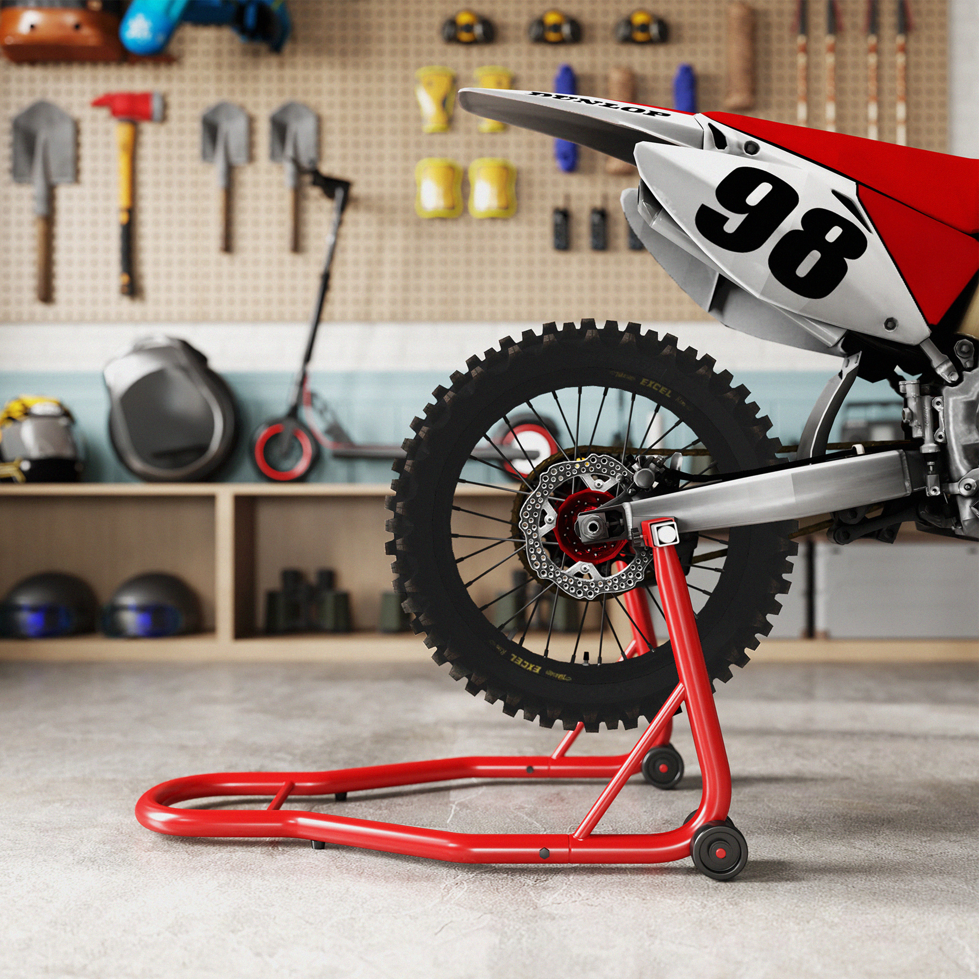 Una moto de motocross con el número 98 en un soporte rojo en un garaje con herramientas en la pared.