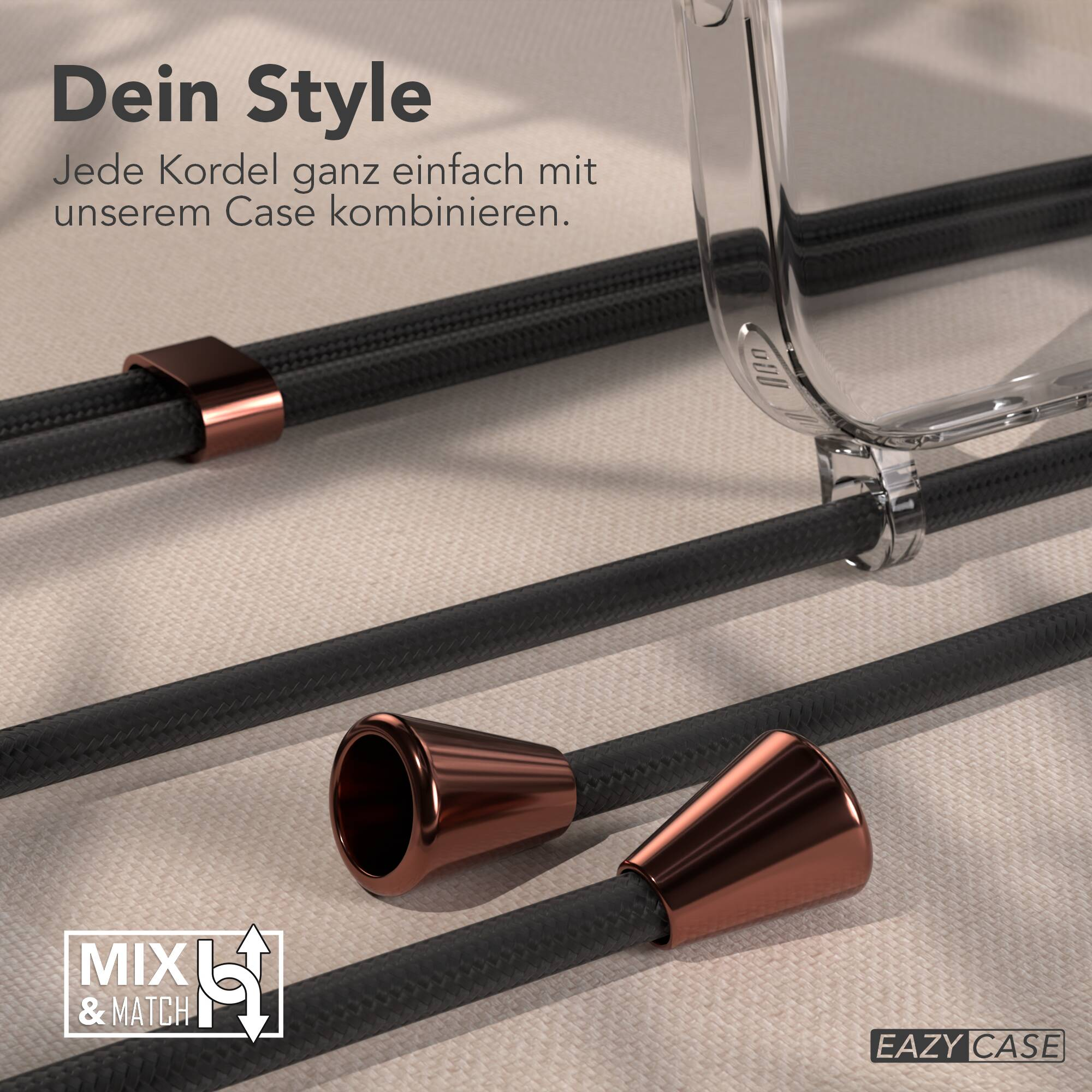 Transparente Handyhülle mit schwarzem Umhängeband und roségoldenen Metallakzenten auf hellem Untergrund.
