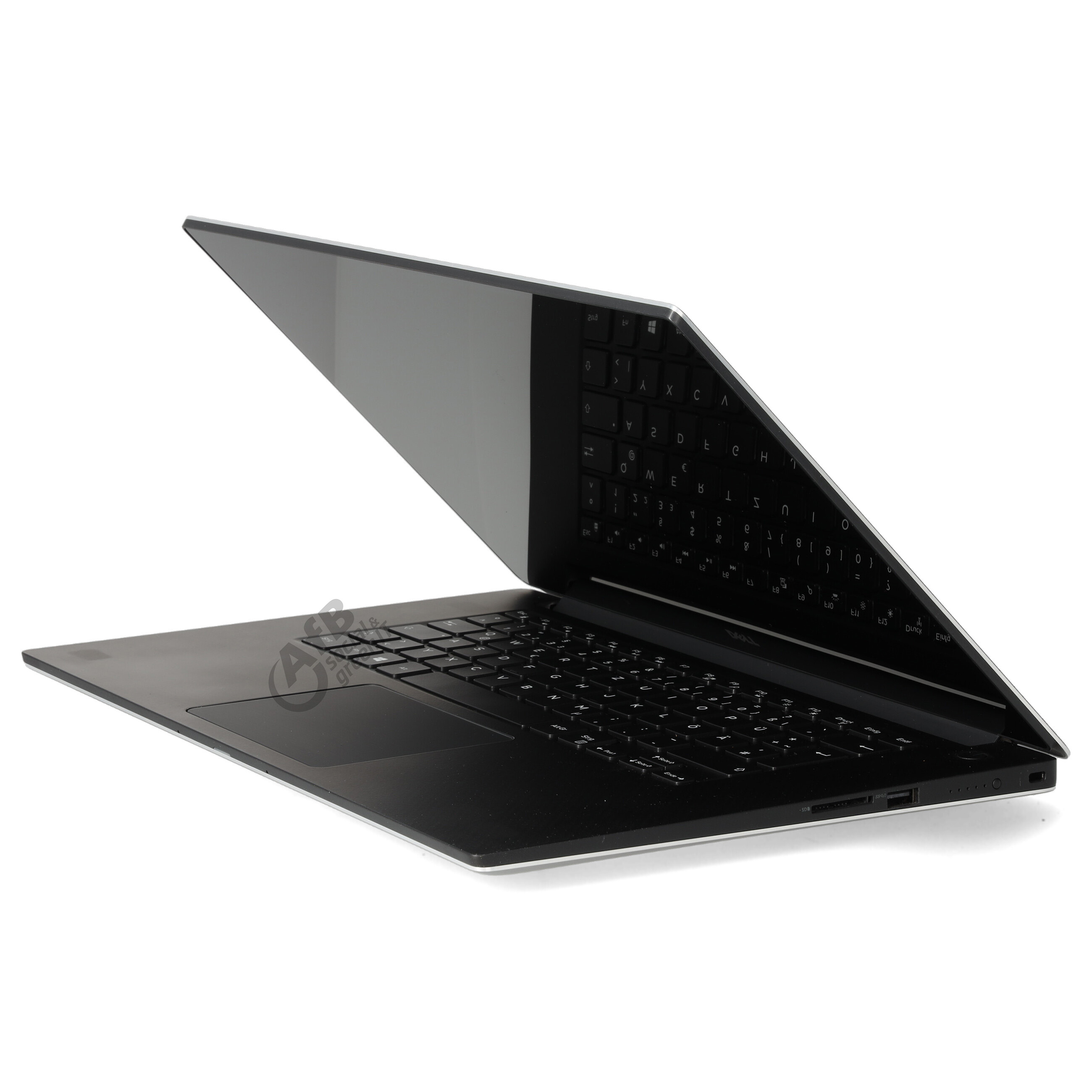 Ein schlanker schwarzer Laptop in Seitenansicht, auf weißem Hintergrund.