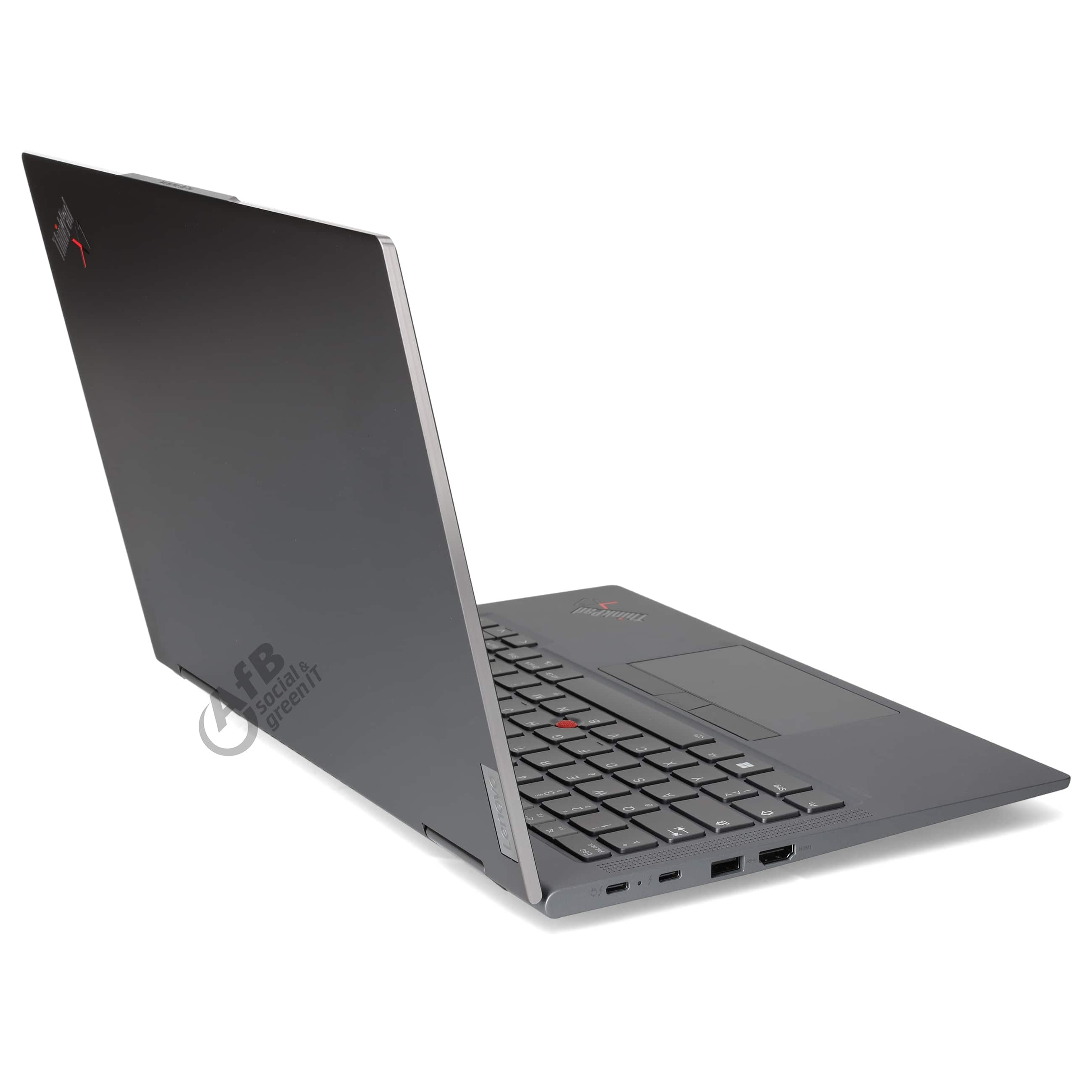 Ein grauer Lenovo-Laptop von der Seite, zeigt Tastatur, Anschlüsse und geschlossenen Bildschirm vor weißem Hintergrund.