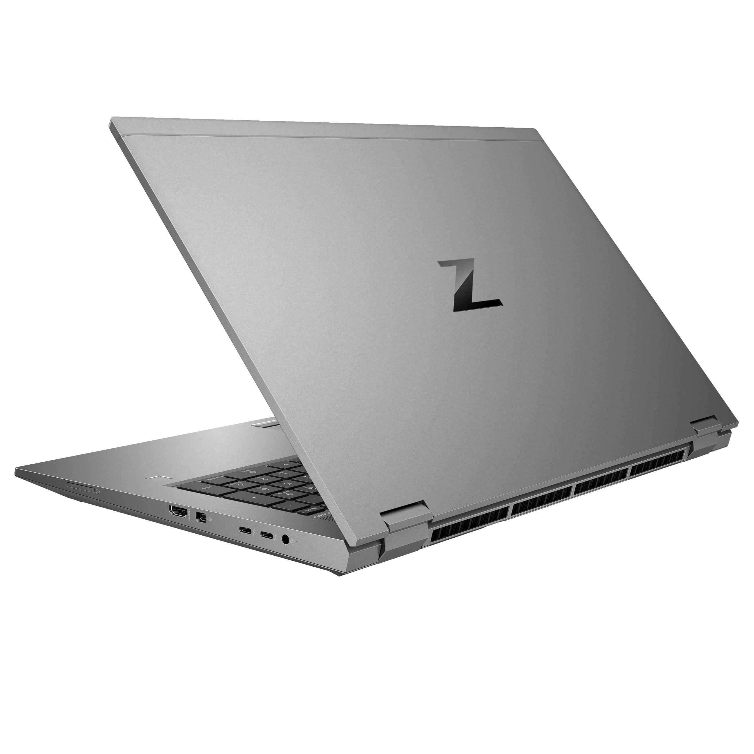 Ein grauer Laptop mit dem Z-Logo auf dem Deckel, schräg von hinten fotografiert vor weißem Hintergrund.