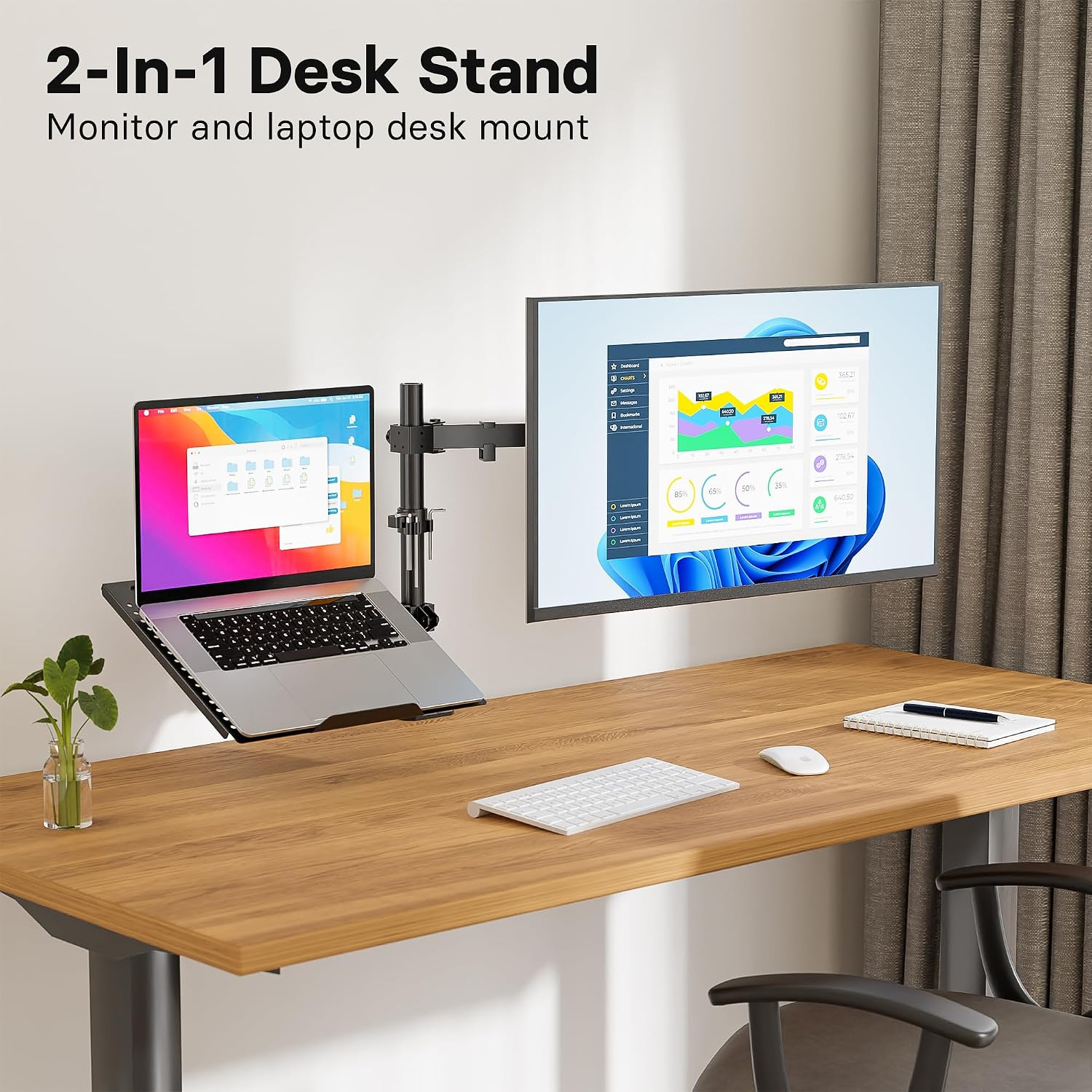 Un soporte de escritorio 2 en 1 con portátil y monitor sobre una mesa de madera con teclado, ratón y planta.