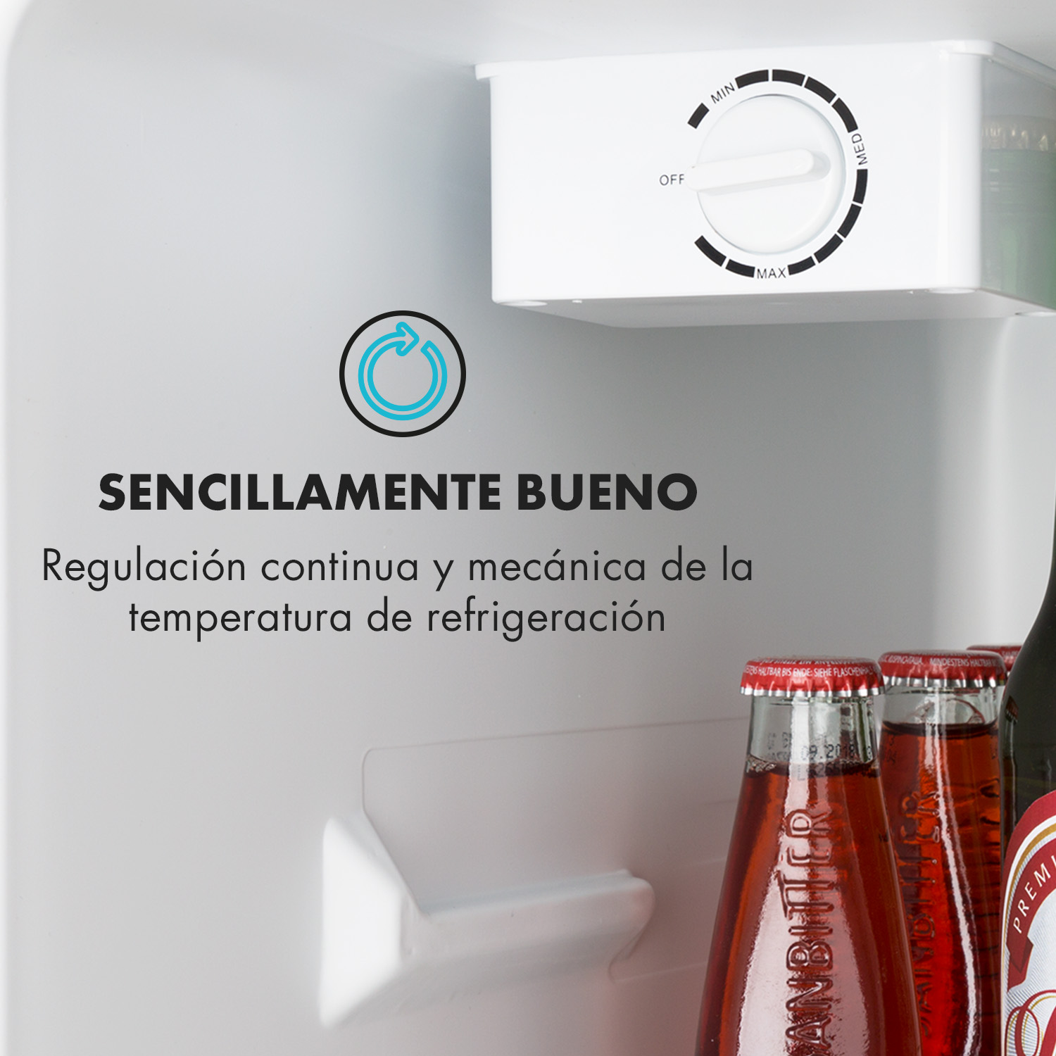 Interior de nevera con rueda de temperatura, texto en español y botellas abajo.