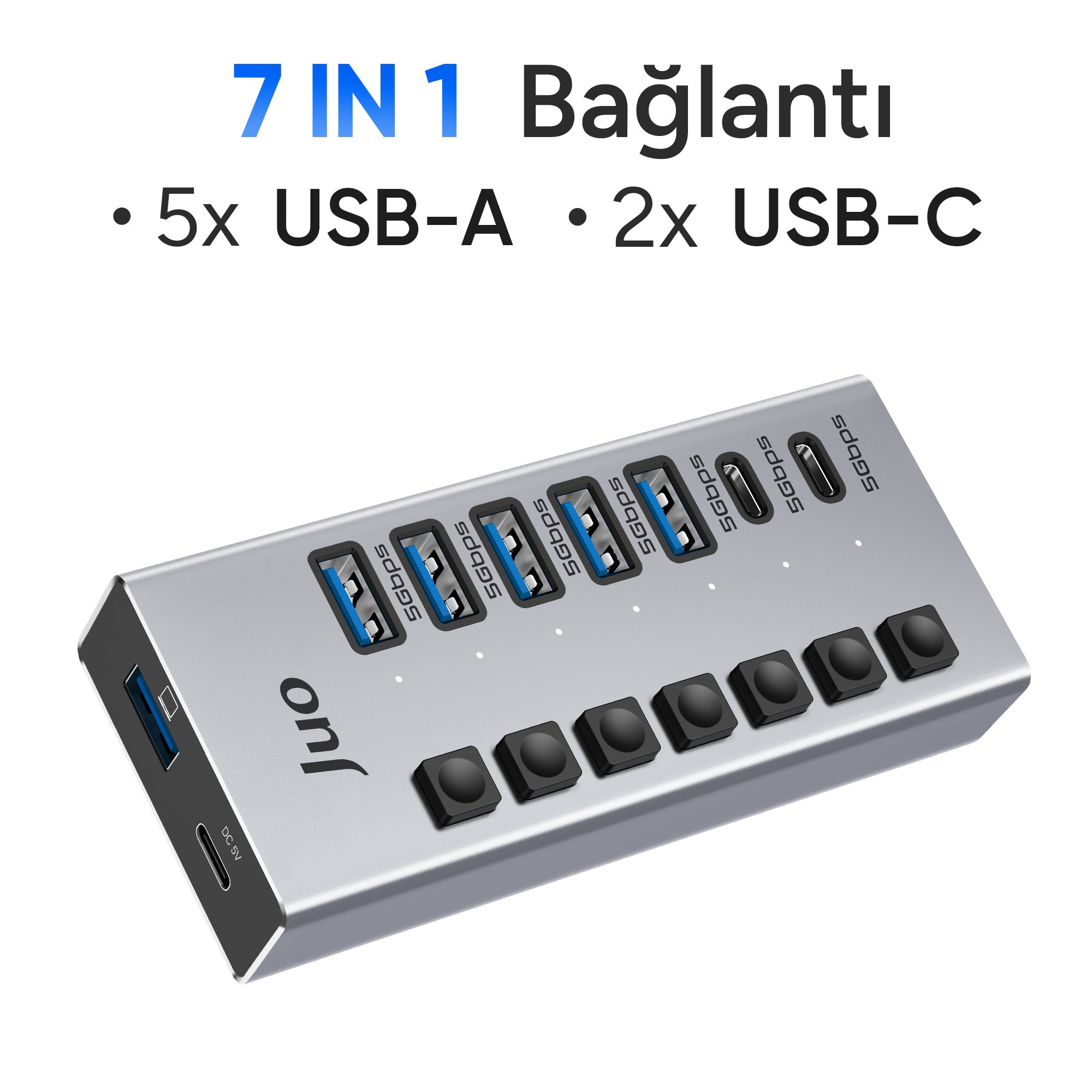 Beş USB-A ve iki USB-C portuna ve bireysel anahtarlara sahip gri Juo 7'si 1 arada USB çoklayıcı.