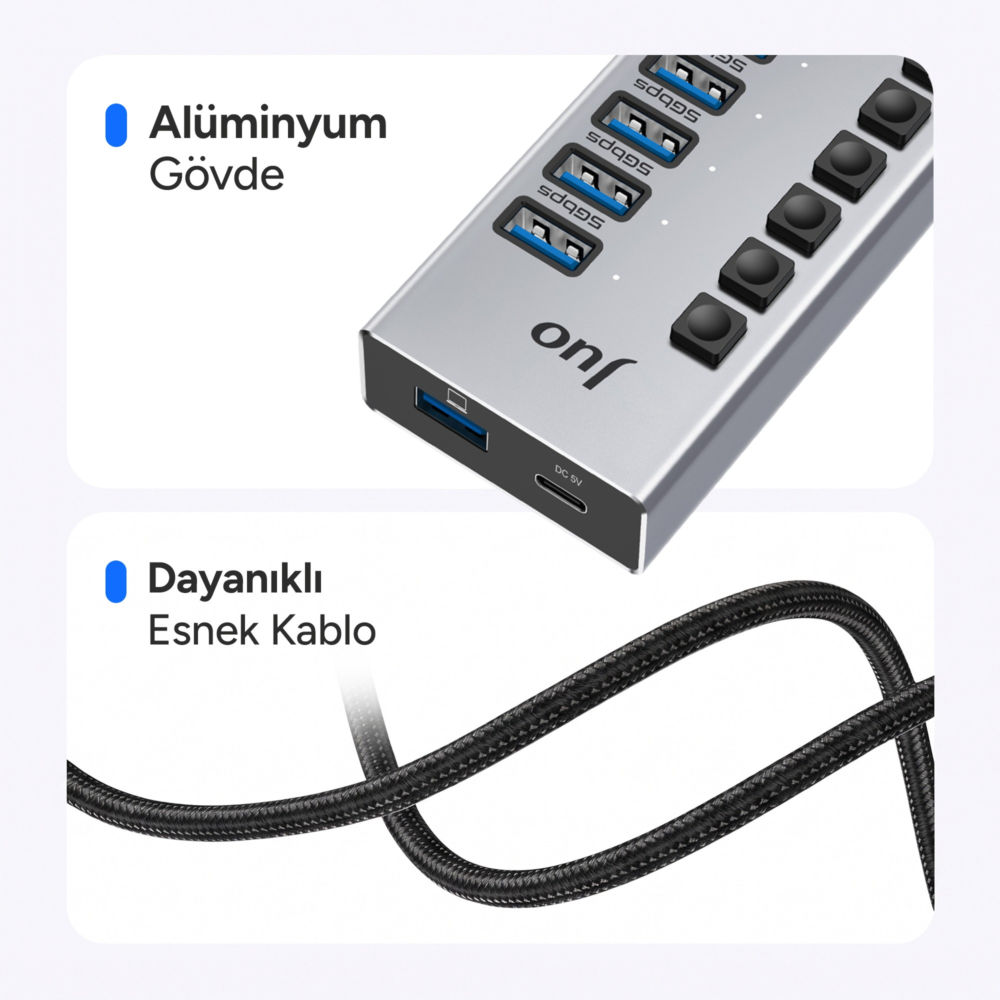 Çoklu port ve düğmelere sahip gümüş renkli USB çoklayıcı ve dayanıklı siyah örgü kablo.