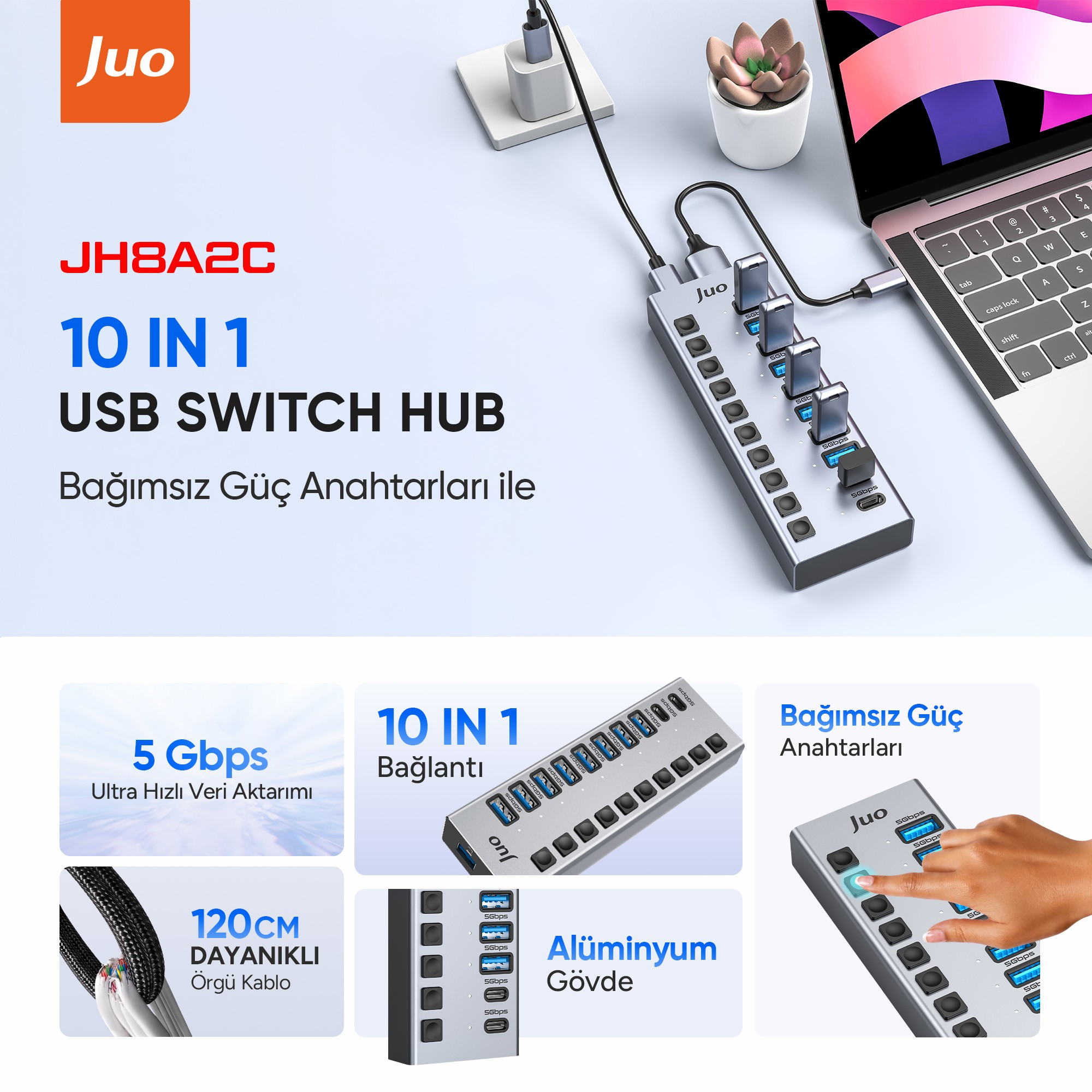 Güç düğmeli JuO 10'u 1 arada USB switch hub, dizüstü bilgisayara bağlı.