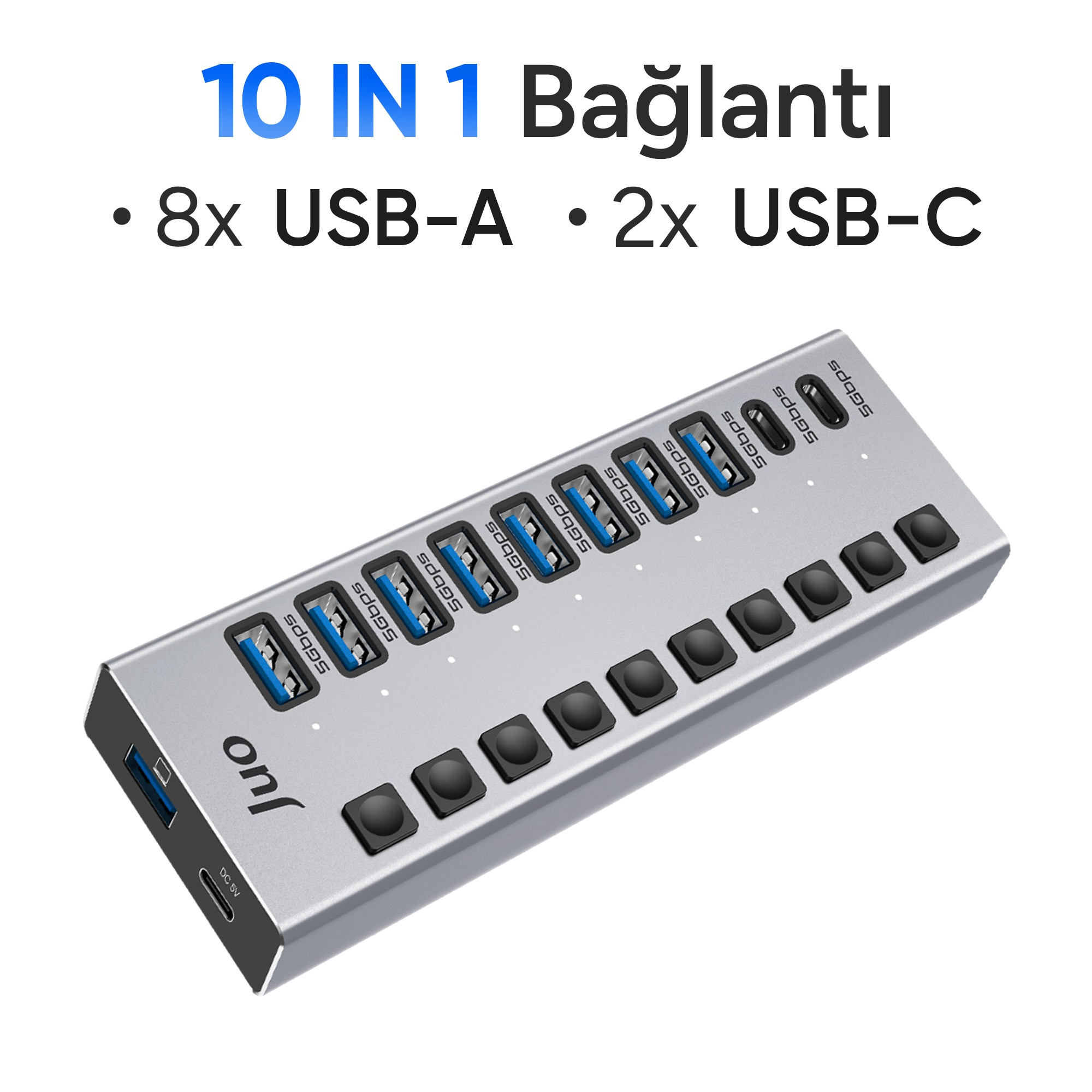 Sekiz USB-A ve iki USB-C portuna ve bireysel anahtarlara sahip gümüş renkli bir USB çoklayıcı.