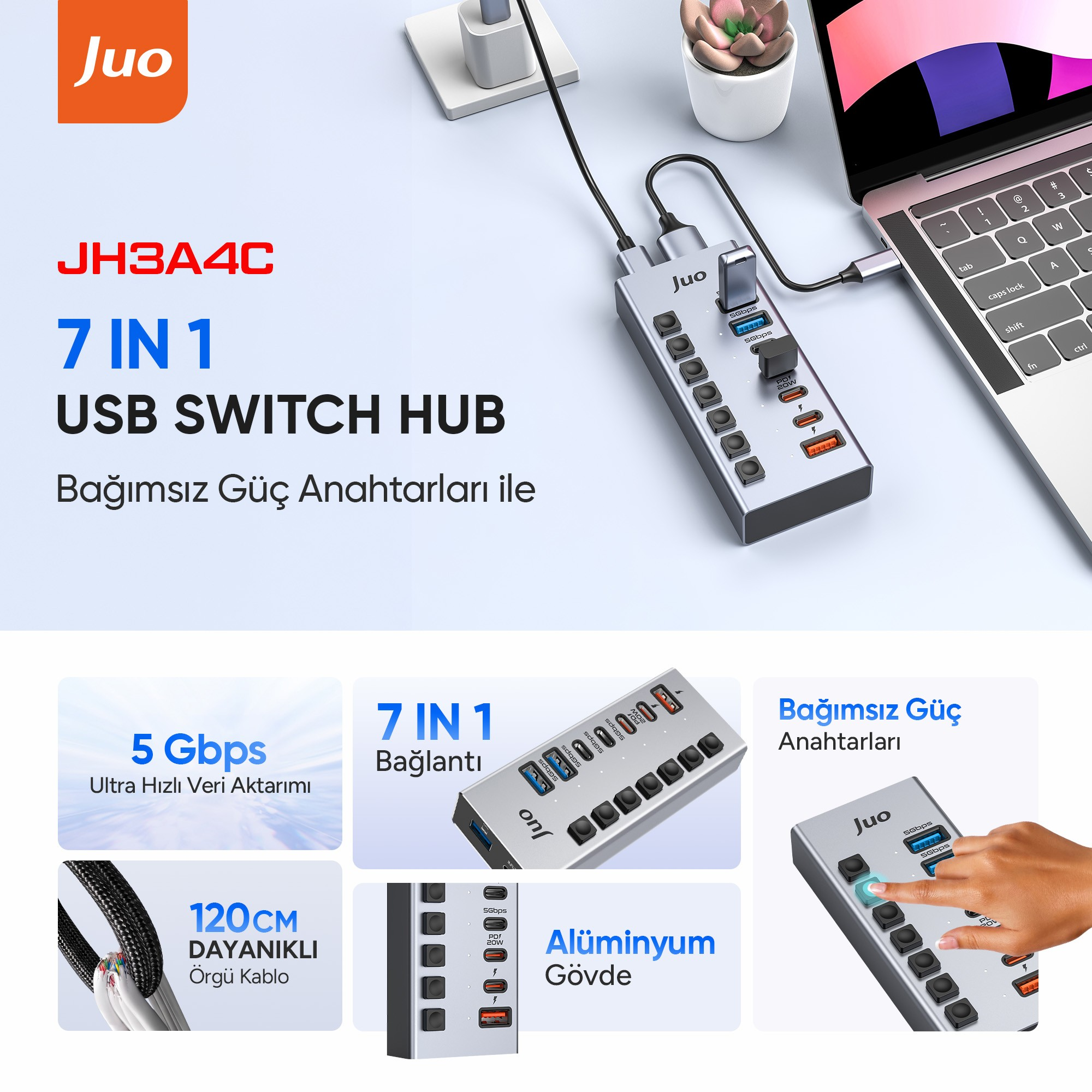 Güç anahtarlı Juo 7'si 1 arada USB switch hub, bir masada dizüstü bilgisayara bağlı.