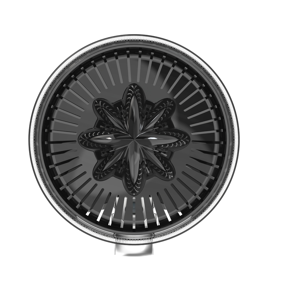 Primer plano cenital de un exprimidor de cítricos negro con un accesorio escariador en forma de estrella.