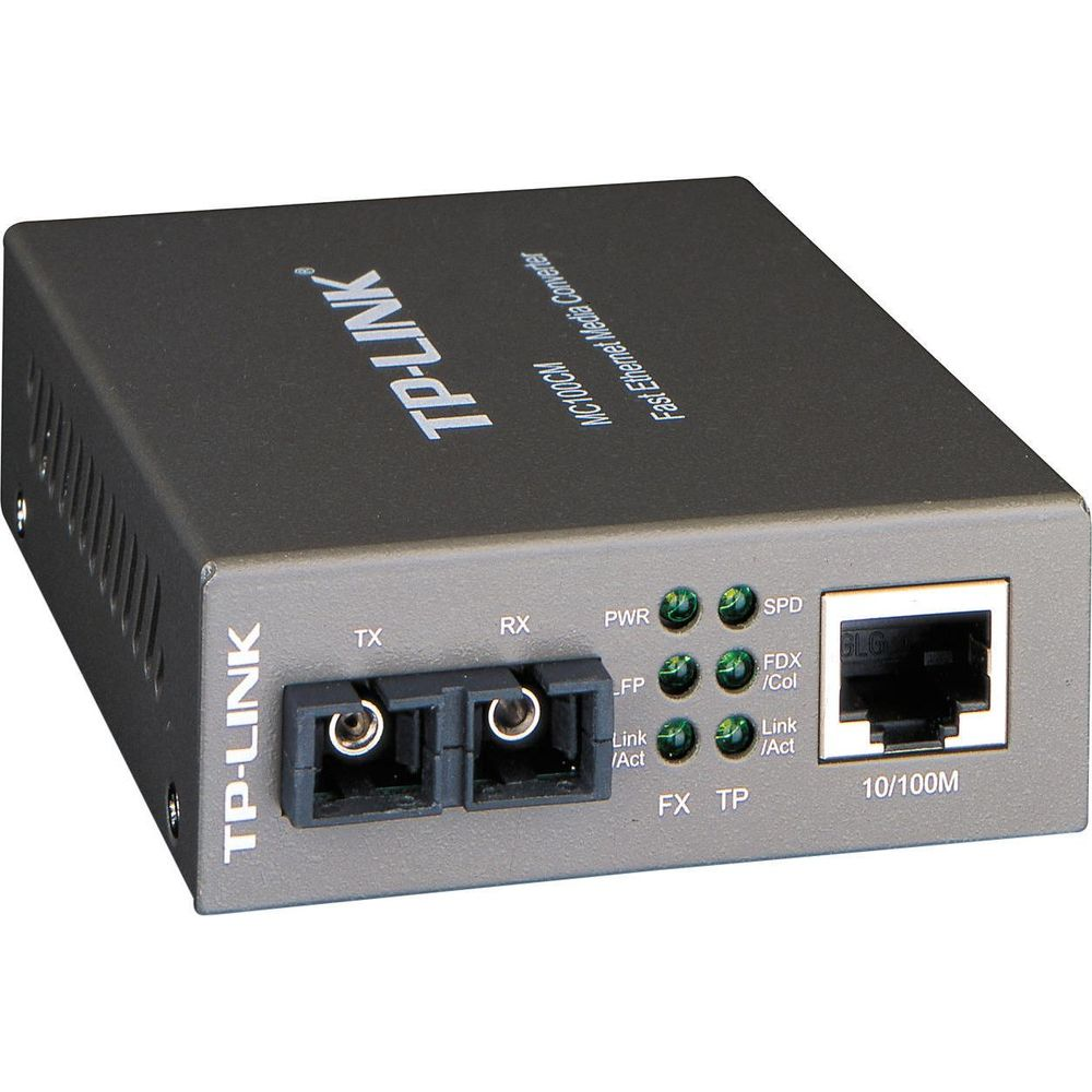Un convertitore multimediale Fast Ethernet TP-Link grigio con due porte in fibra, LED di stato e una porta RJ45.