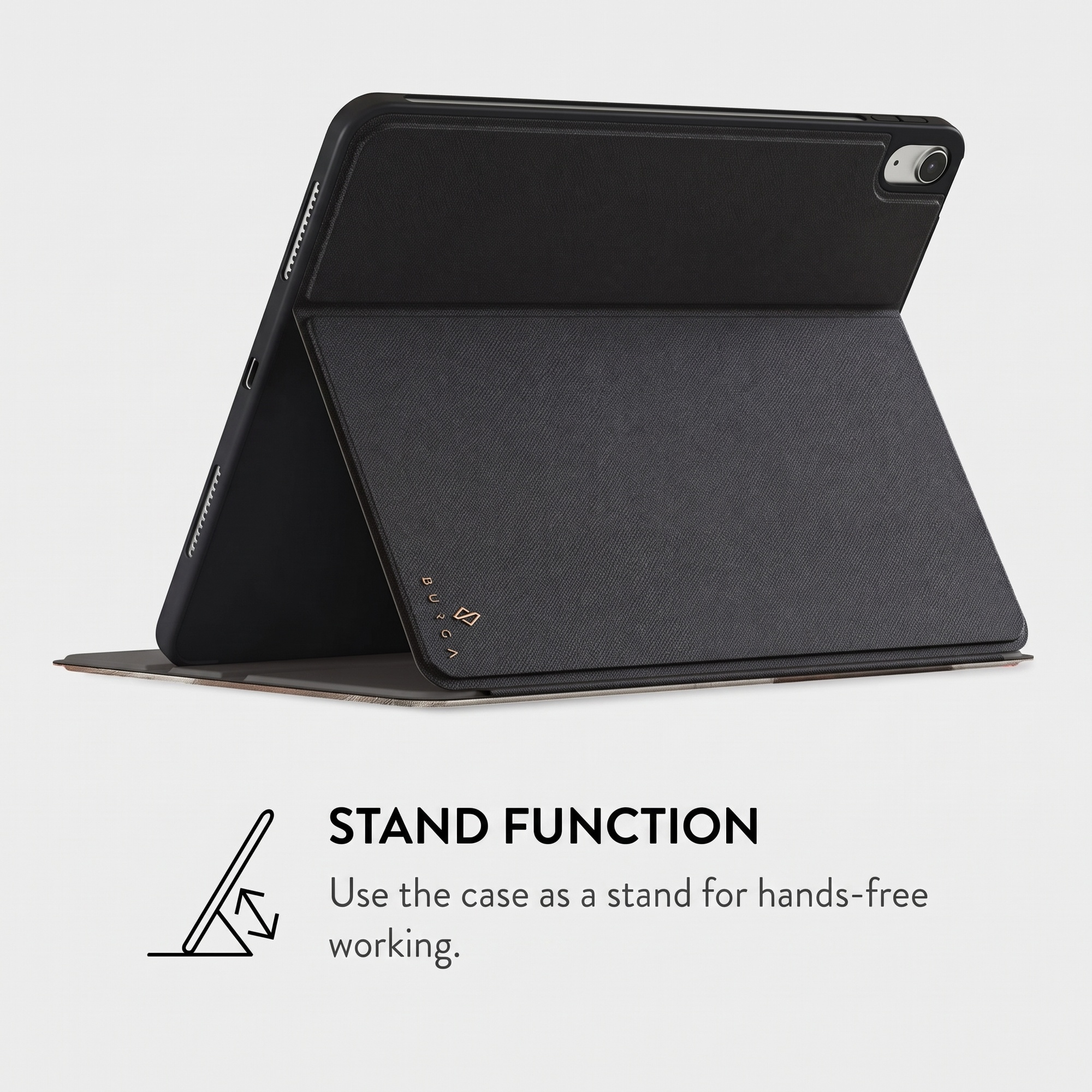 A tablet in a black protective case functioning as a stand, against a grey background.