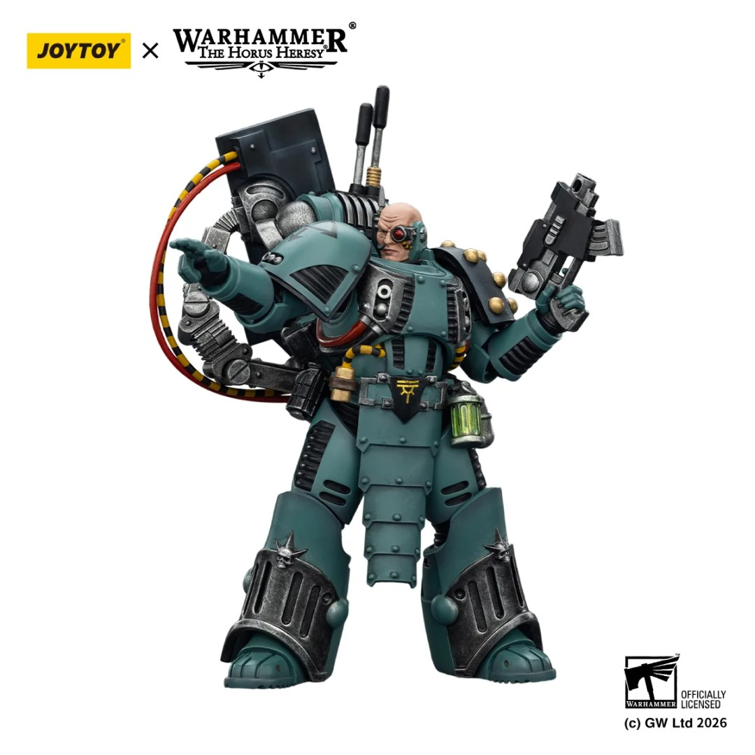 Zielona figurka akcji Warhammer w zbroi, z dużym plecakiem i bronią.