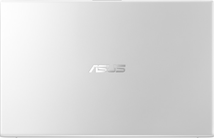 La cover superiore argentata chiusa di un laptop ASUS con un logo argentato al centro.