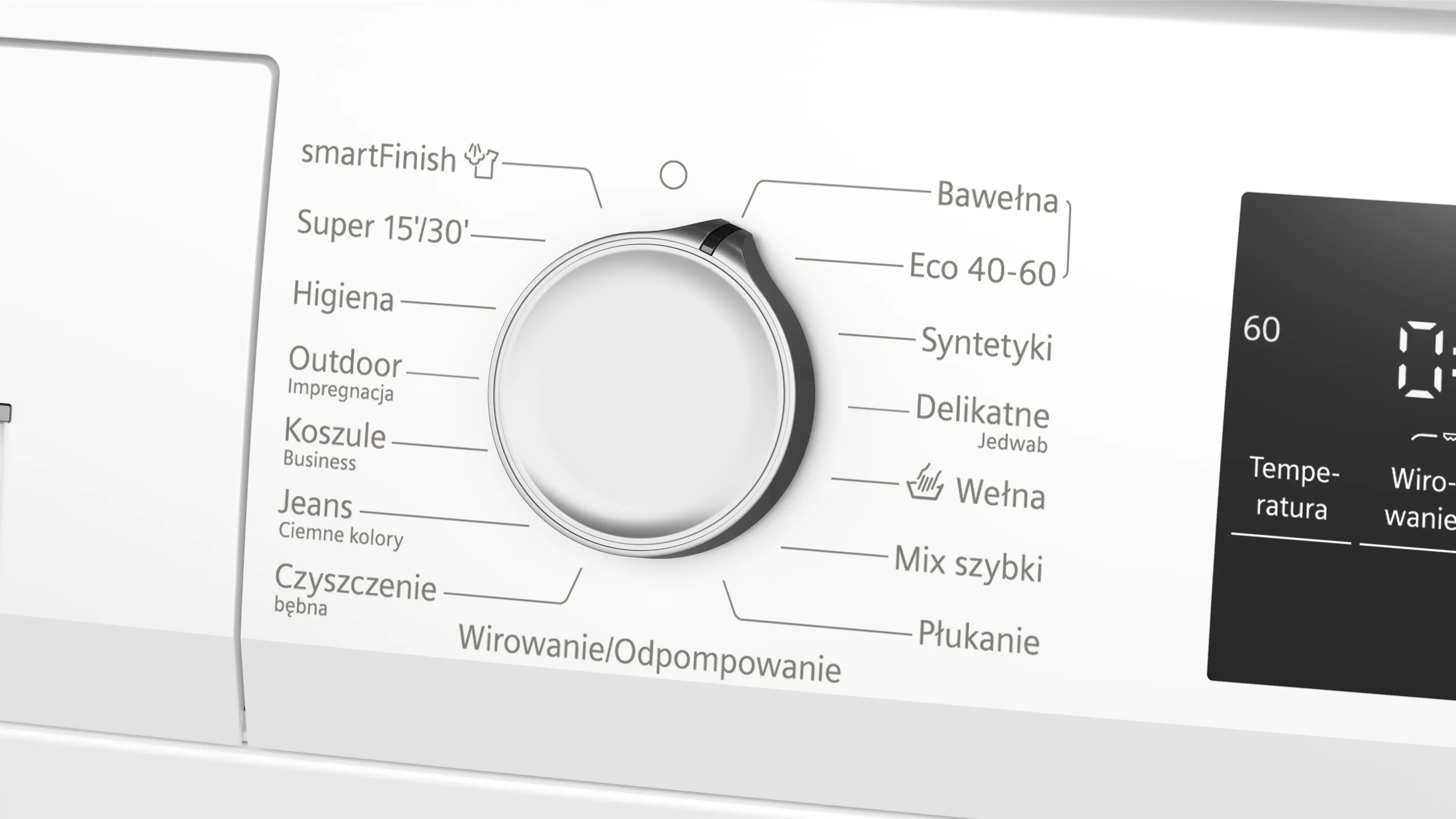 Zbliżenie okrągłego pokrętła wyboru programów na białej pralce z polskimi opisami programów.