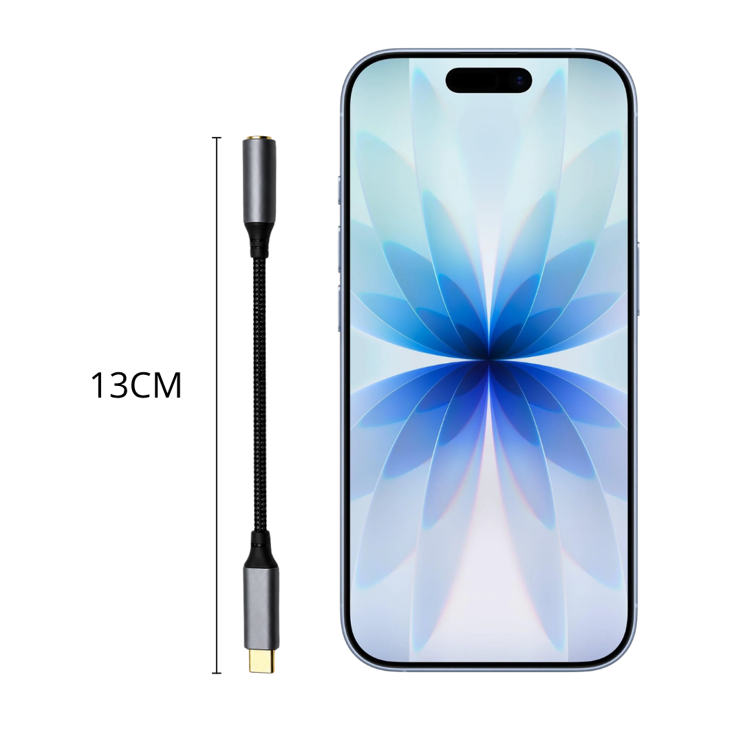 A 13cm USB-C to audio adapter cable next to a modern smartphone with a floral display.