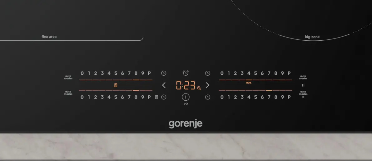 Czarna płyta indukcyjna Gorenje z cyfrowym sterowaniem dotykowym i zegarem.
