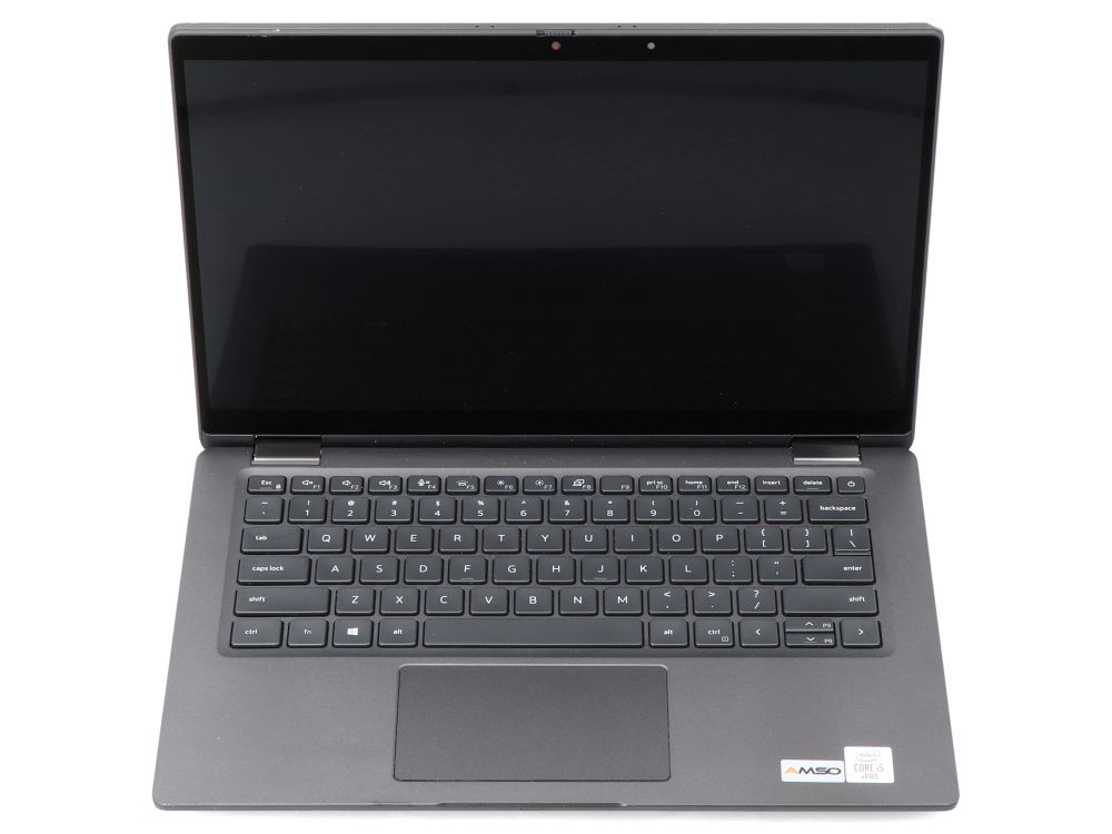Szary laptop widziany z góry, z czarnym ekranem i klawiaturą QWERTY na białym tle.