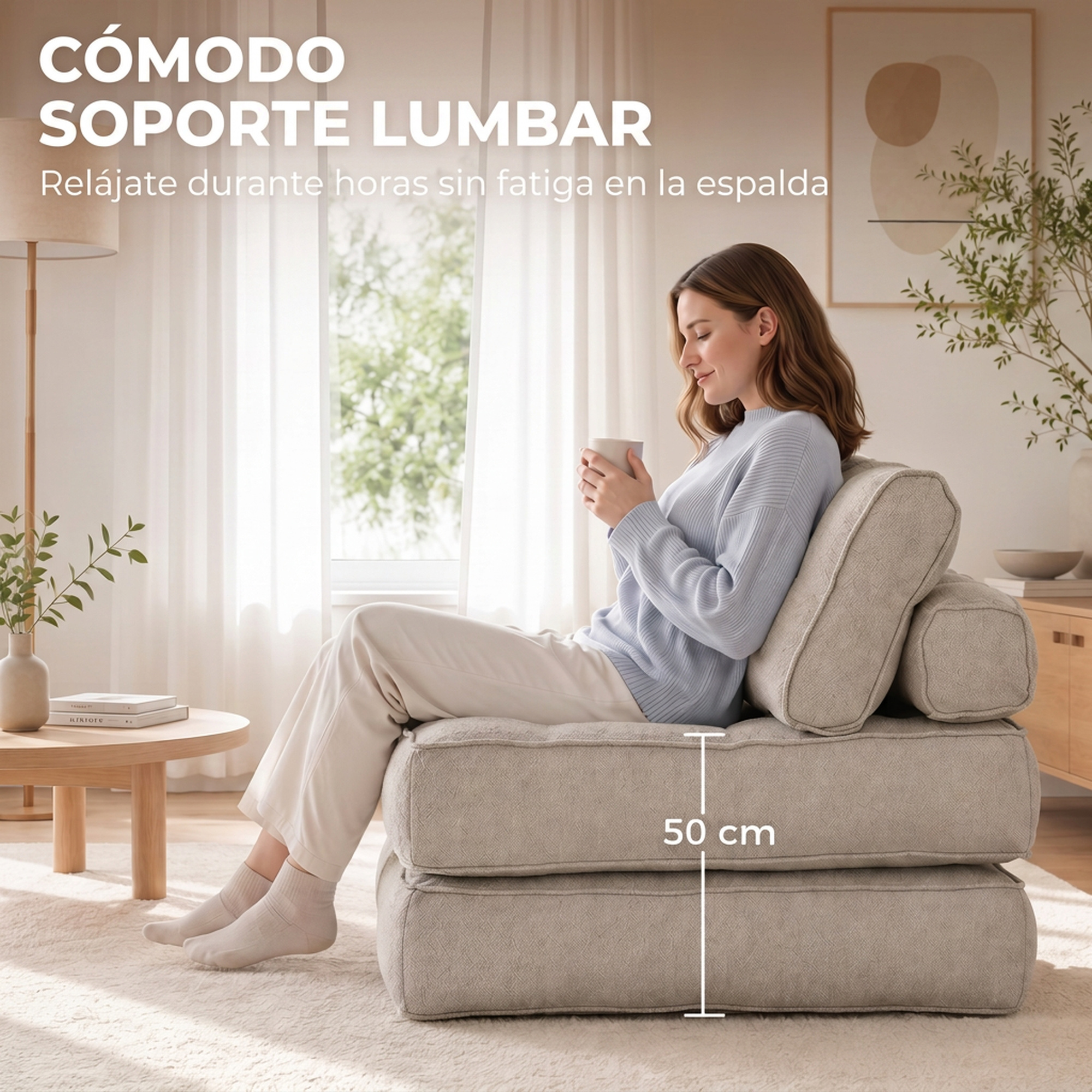 Una mujer se relaja en un sillón modular beige con una taza en una habitación luminosa.
