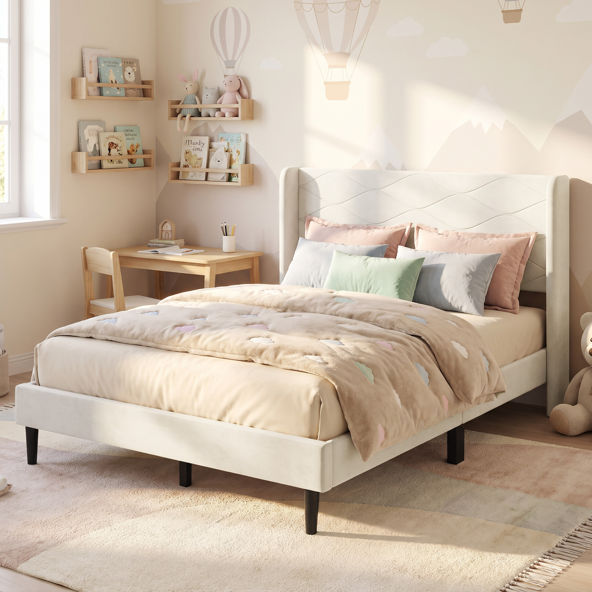 Dormitorio infantil con cama tapizada blanca, cojines coloridos, escritorio pequeño y arte de globos aerostáticos en la pared.