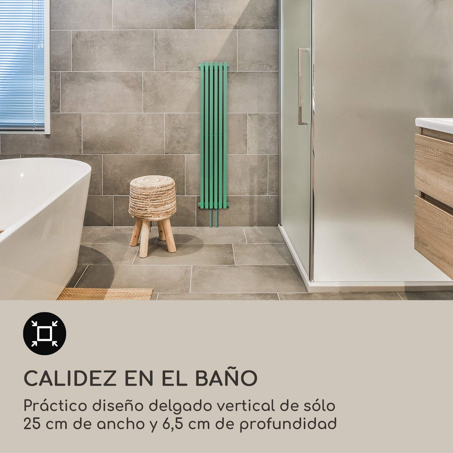 Baño moderno con azulejos grises, bañera, ducha, taburete de madera y un radiador vertical verde.