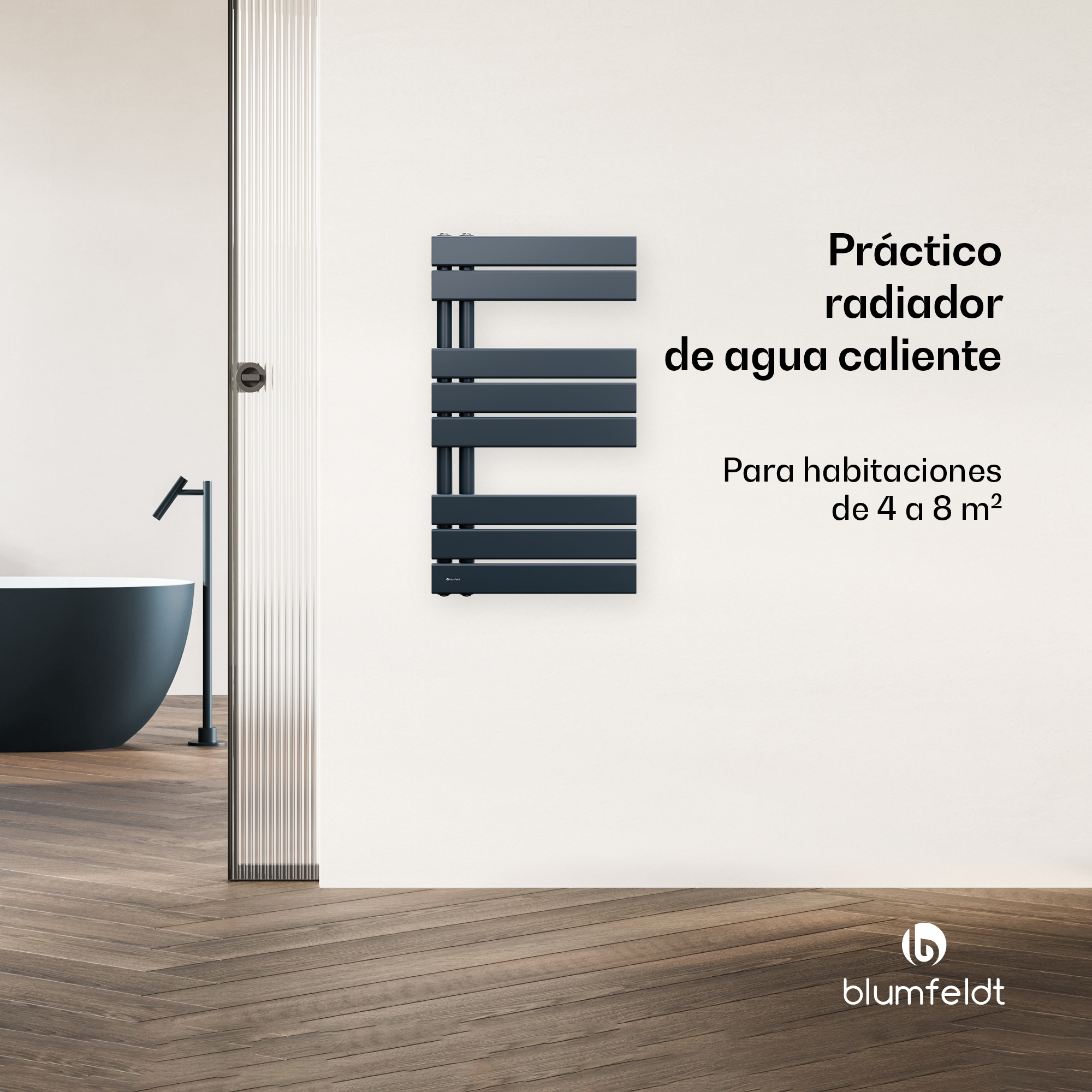 Un radiador toallero gris en una pared blanca junto a un baño con bañera.