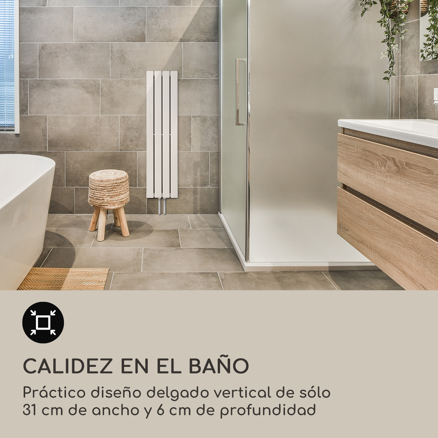 Baño moderno con bañera, mueble de madera, radiador vertical blanco y azulejos grises.