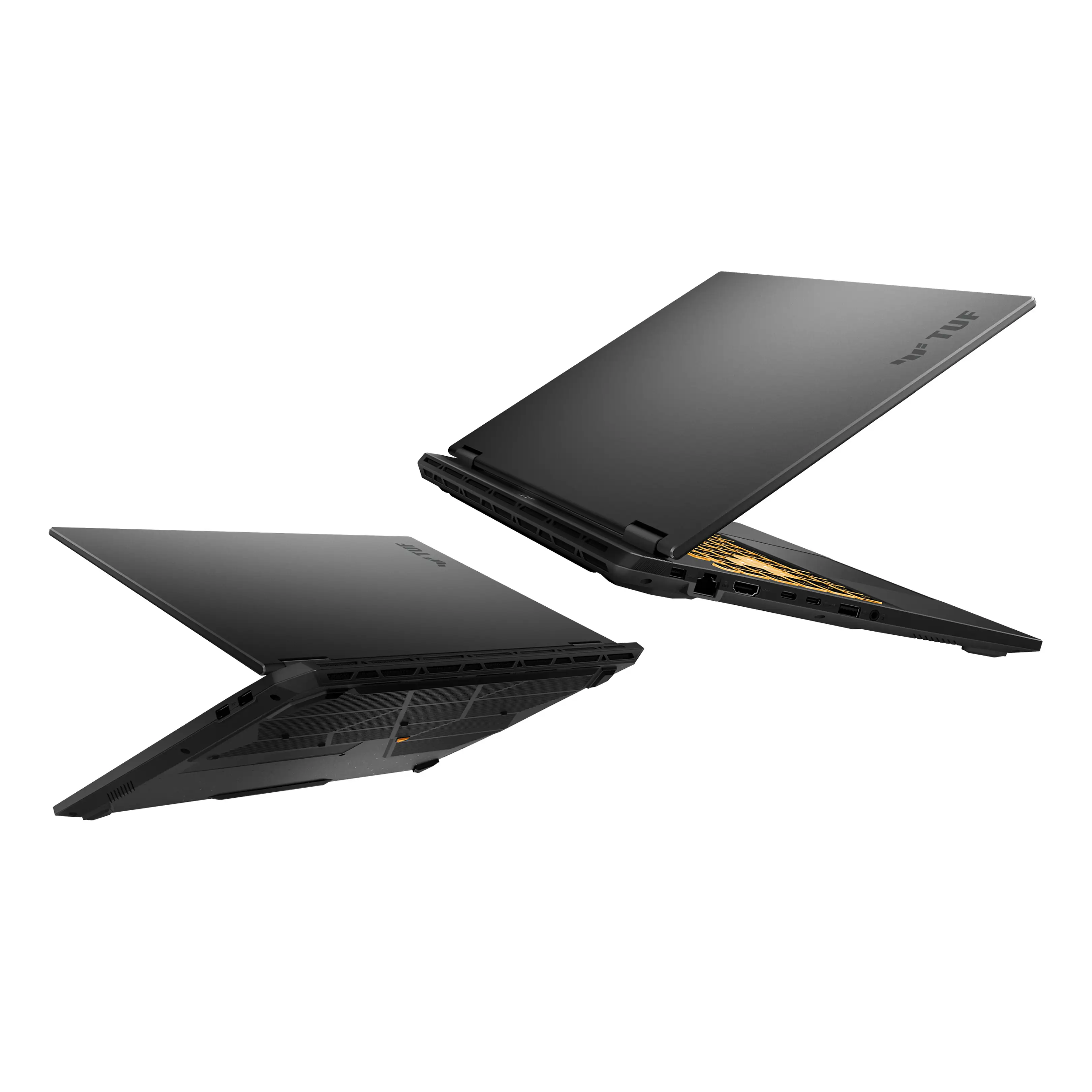 Due laptop TUF neri fluttuanti su uno sfondo bianco.