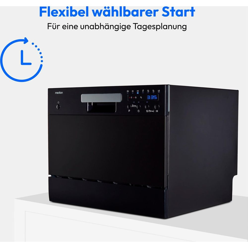 Eine schwarze Spülmaschine steht auf einer weißen Fläche mit deutschem Text und Uhrsymbol.