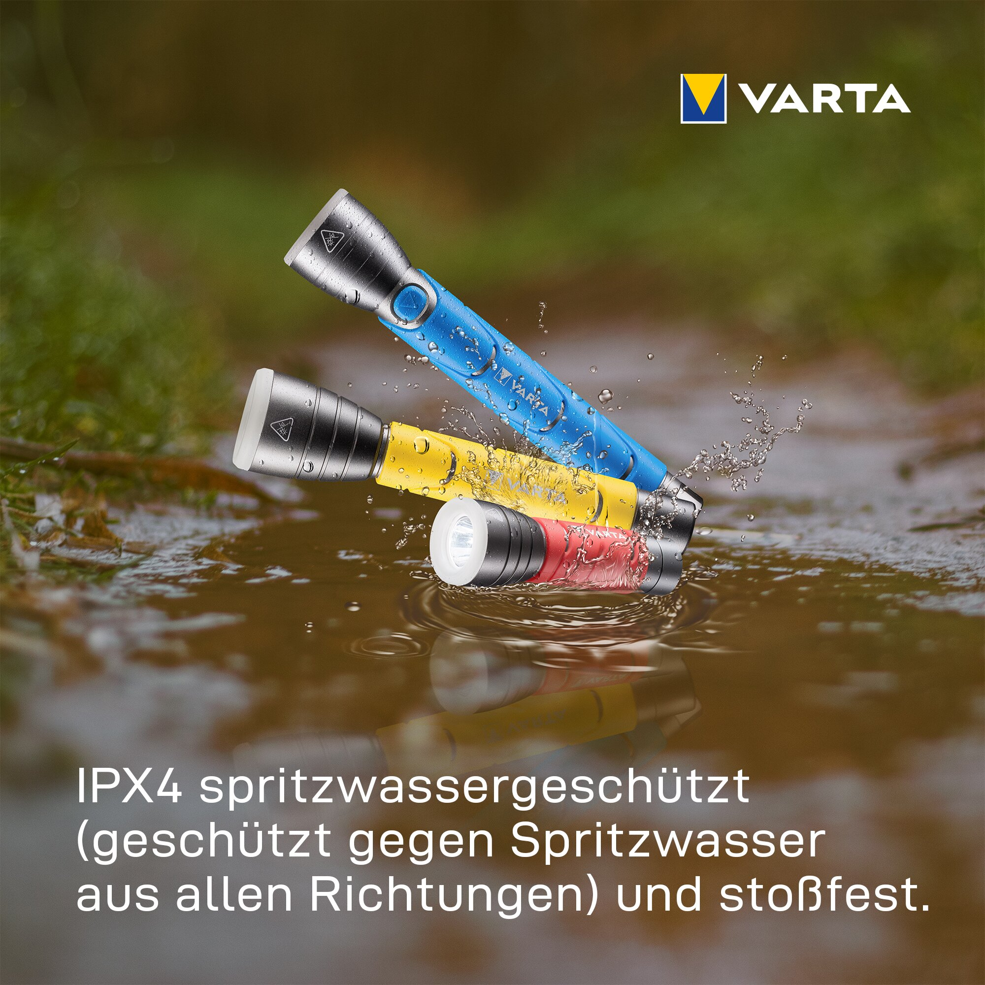 Three colorful Varta flashlights splashing water in a puddle, with Varta logo top right.