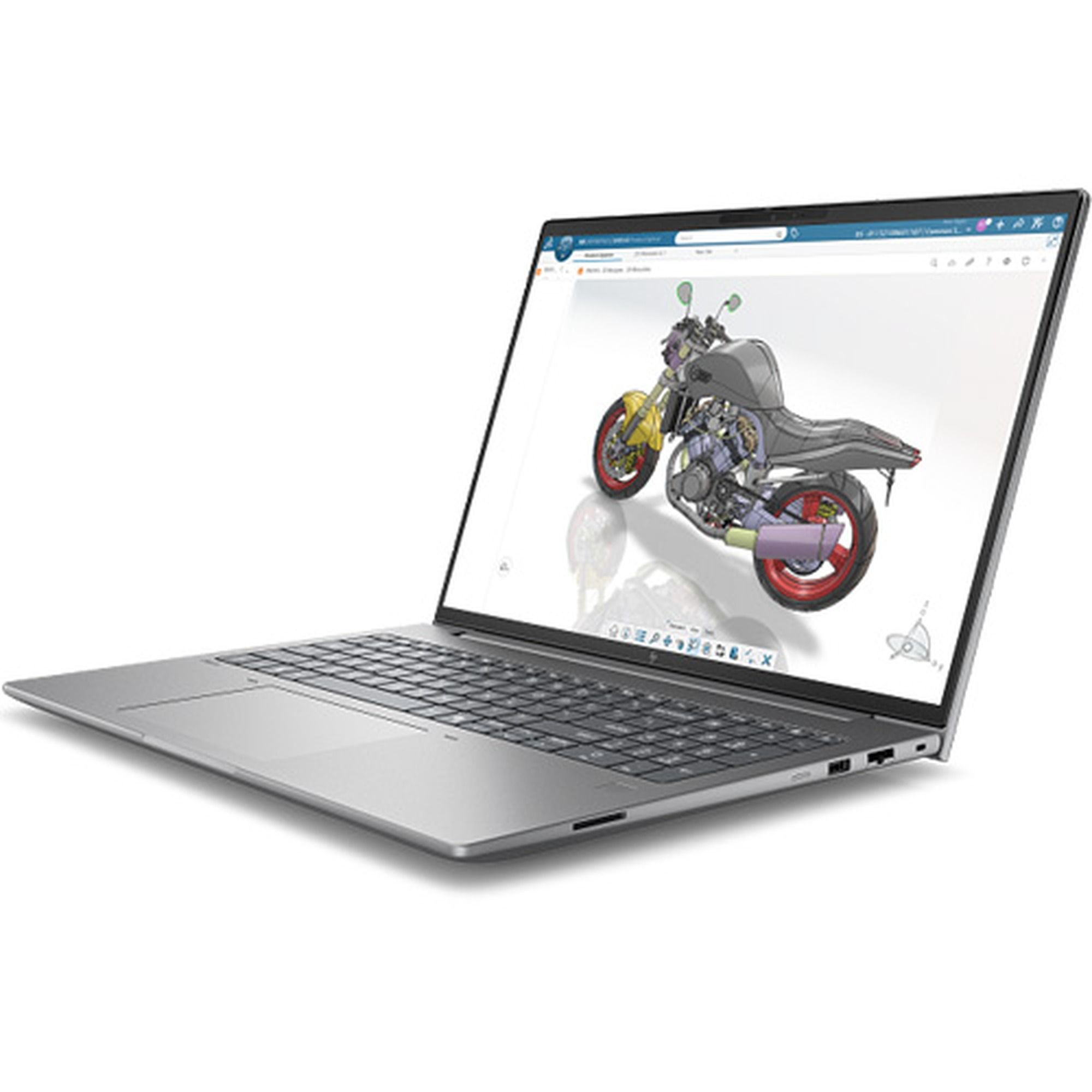 Beyaz bir masa üzerindeki gümüş dizüstü bilgisayar, ekranda bir motosikletin CAD çizimini gösteriyor.