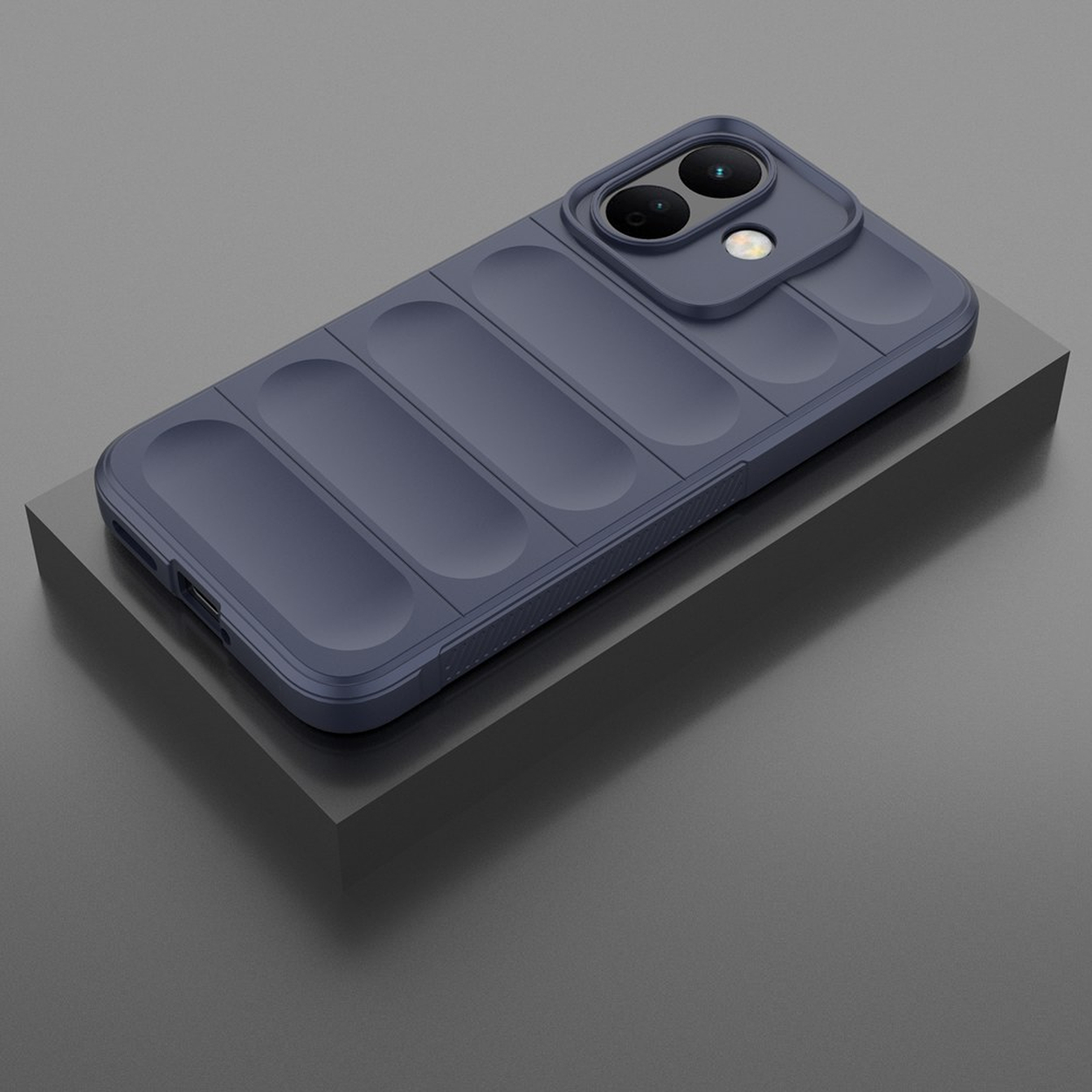 Coque de protection pour smartphone bleu foncé avec un design matelassé sur fond gris.
