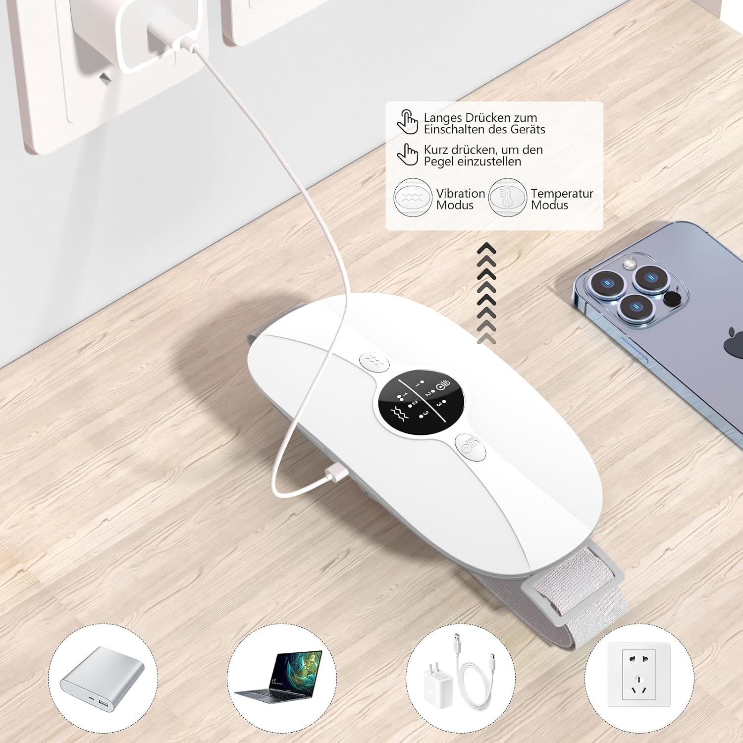 Weißes elektrisches Massagegerät mit Display auf Holzoberfläche, verbunden mit weißem Ladekabel und Smartphone.