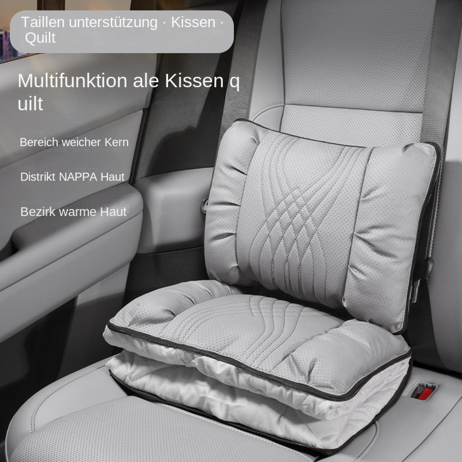 Ein graues Multifunktionskissen auf einem Autositz mit integriertem Kissen und Quilt.