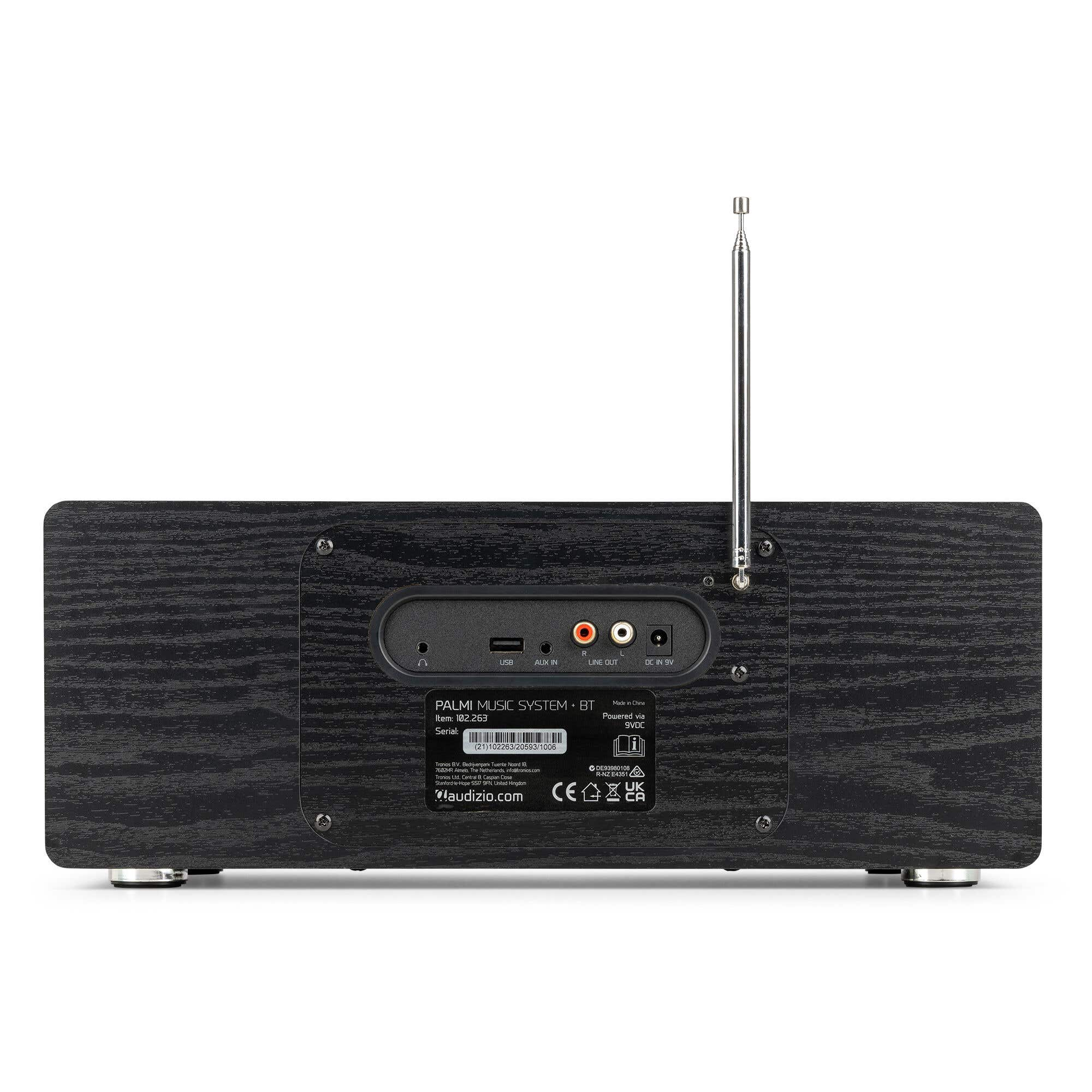 Die Rückseite eines Audizio Palmi Music Systems zeigt verschiedene Anschlüsse, Etiketten und eine ausziehbare Antenne.