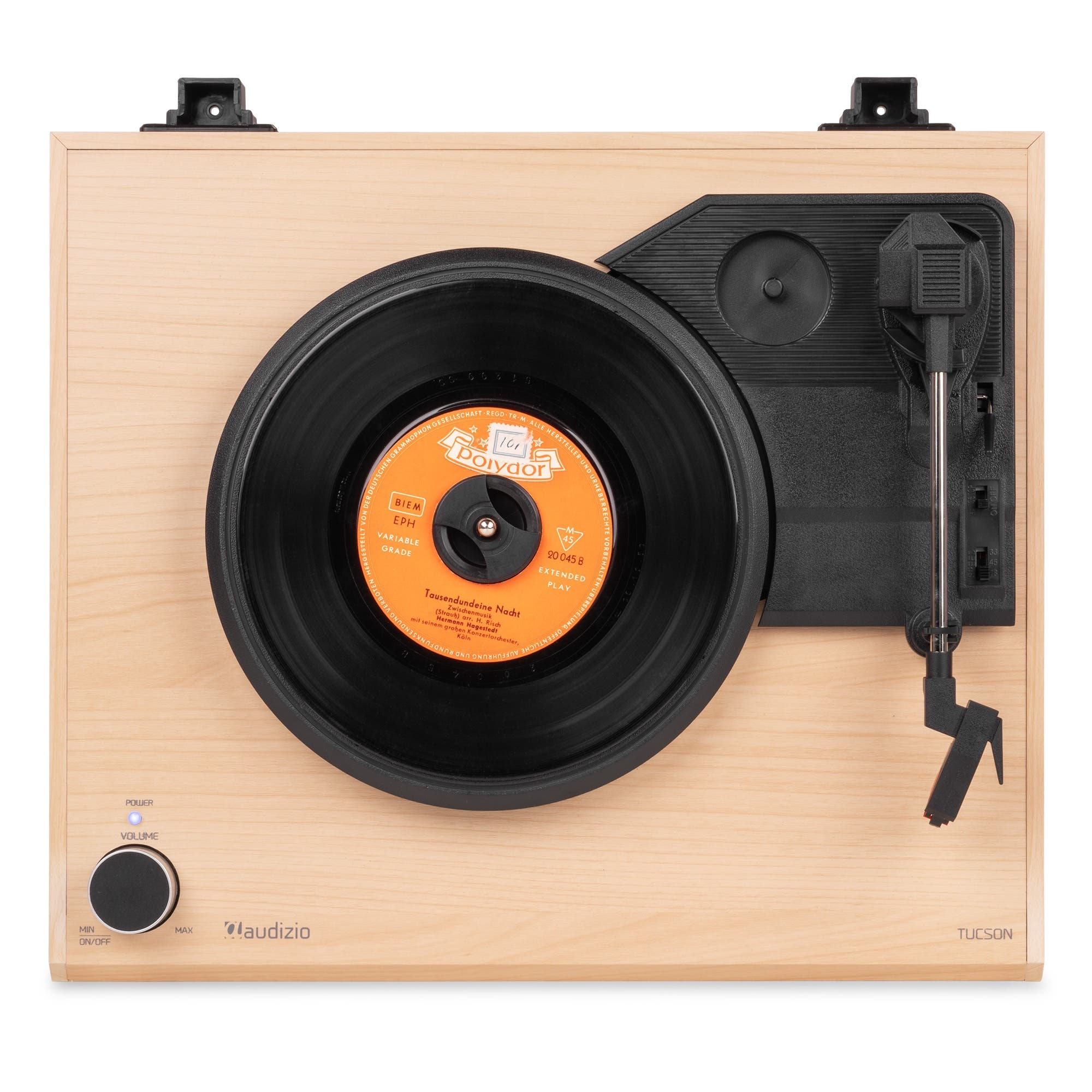 Ein holzfarbener Audizio Tucson Plattenspieler mit schwarzem Vinyl und Tonarm von oben.