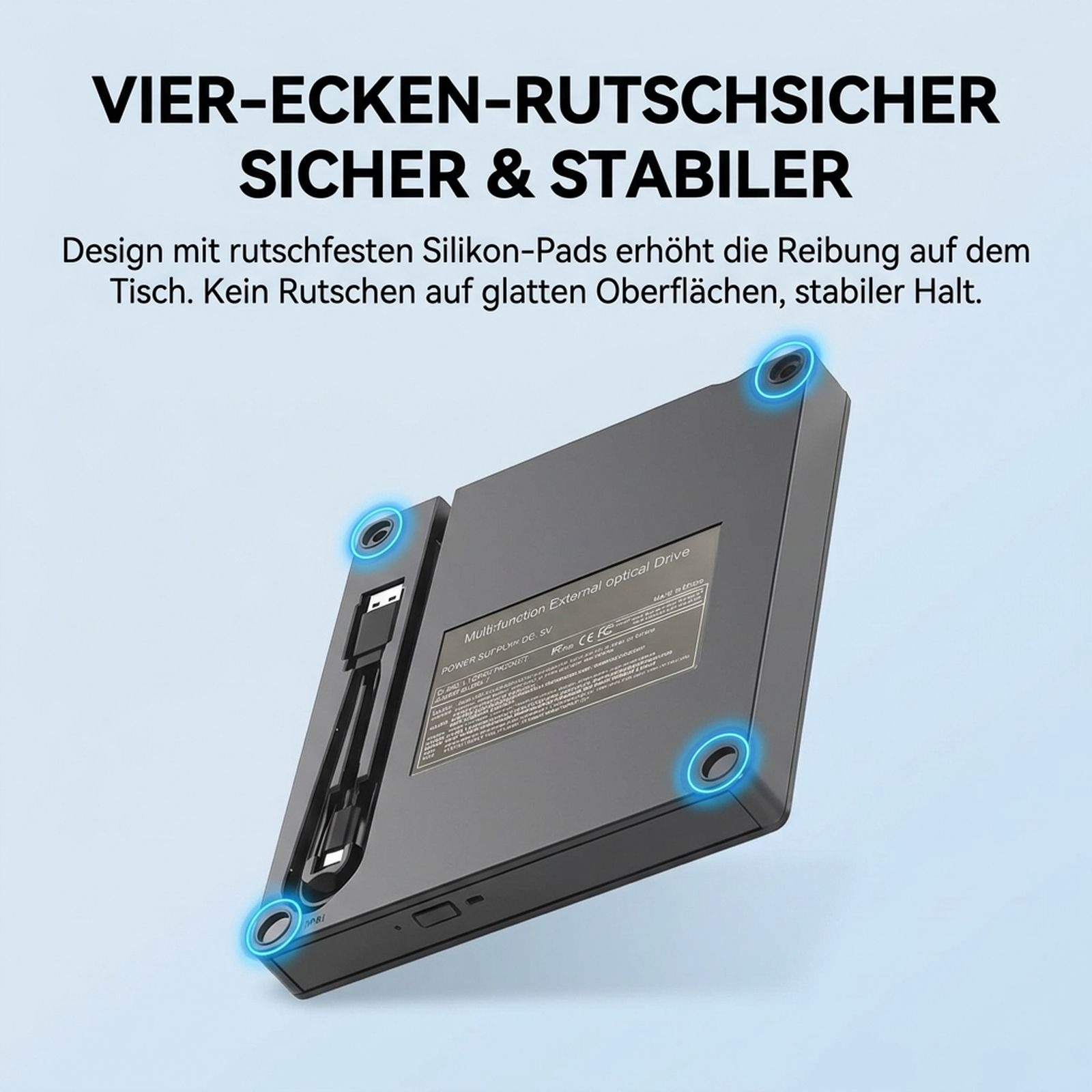 Unterseite eines externen Laufwerks mit vier rutschfesten Silikonpads in den Ecken und blauen Leuchtkreisen.