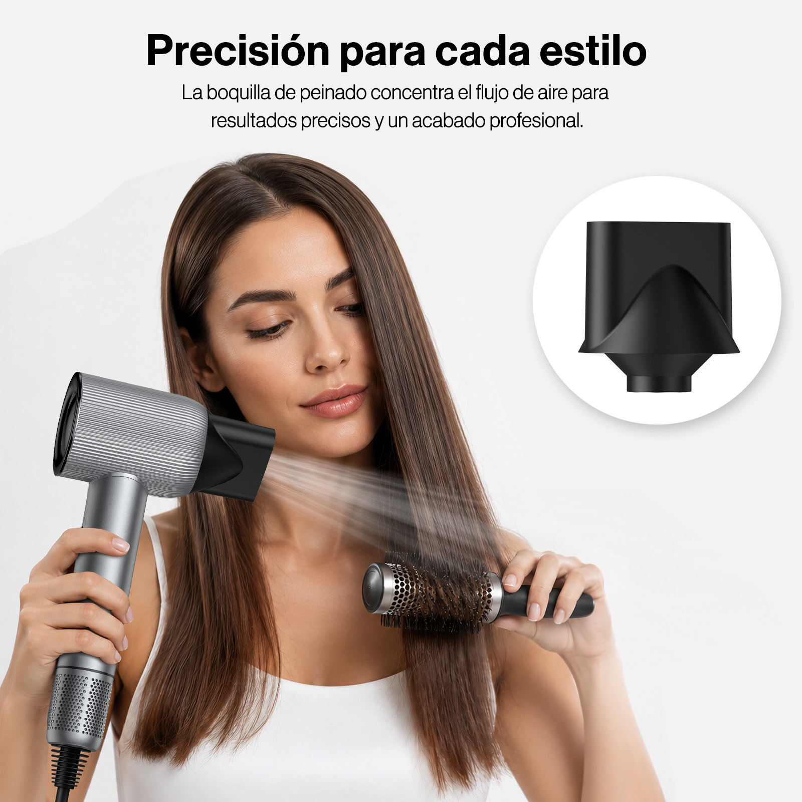 Una mujer seca su largo cabello castaño con un secador plateado y un cepillo redondo.
