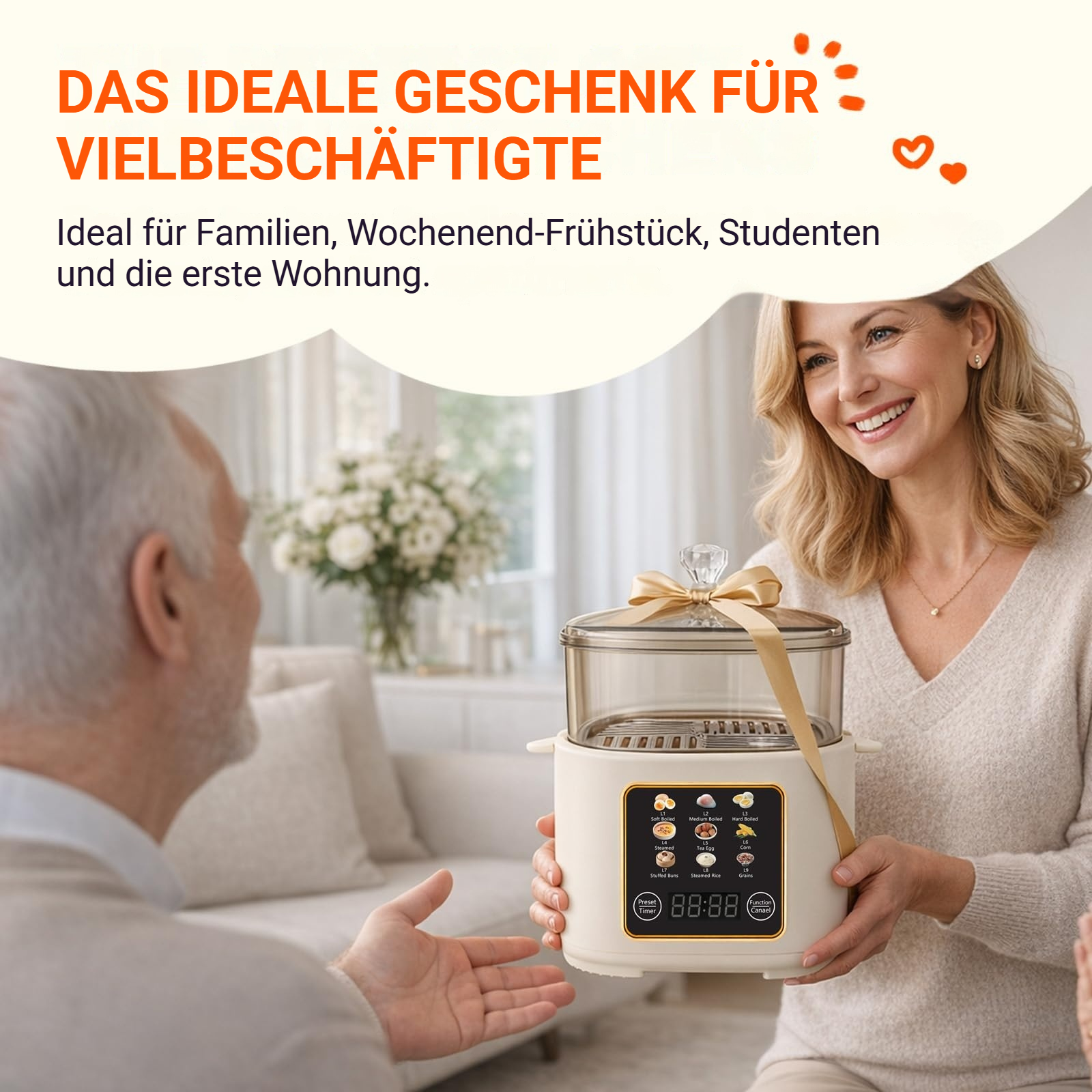 Eine Frau schenkt einem Mann ein Multifunktionskochgerät in einer hellen Wohnung.
