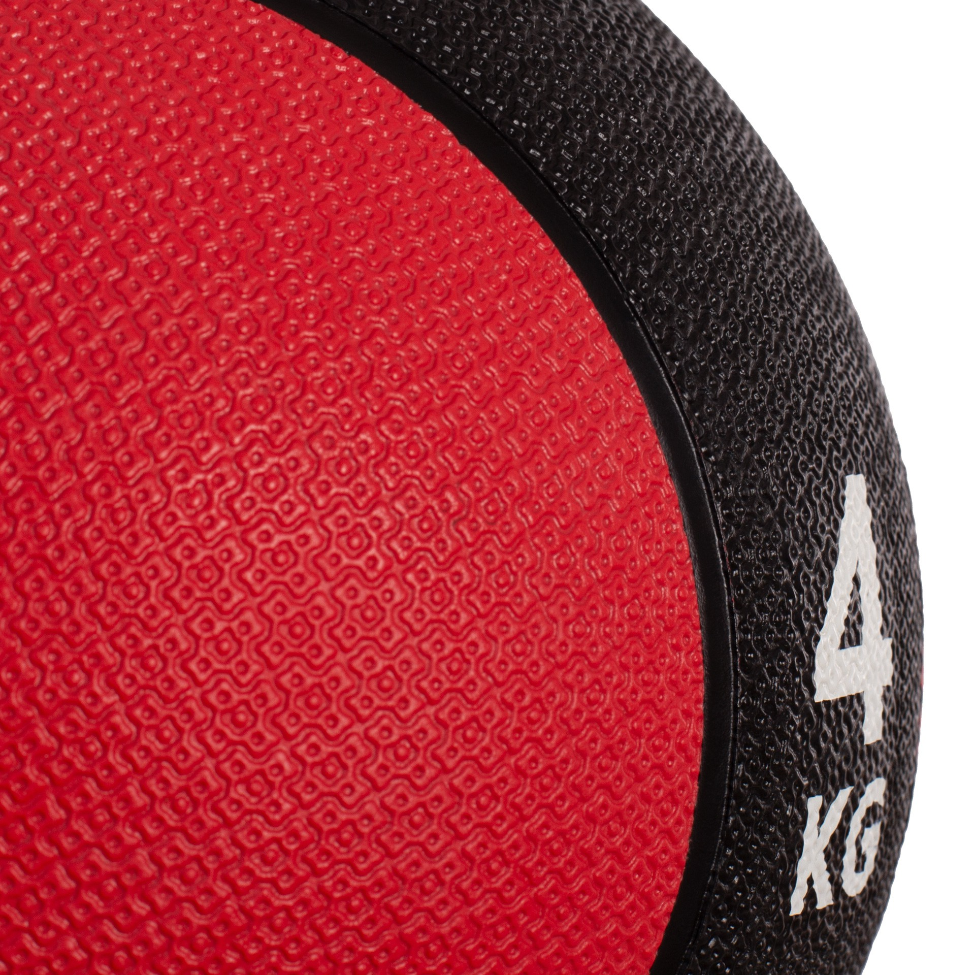 Primer plano de un balón medicinal rojo y negro con la inscripción 4 kg.