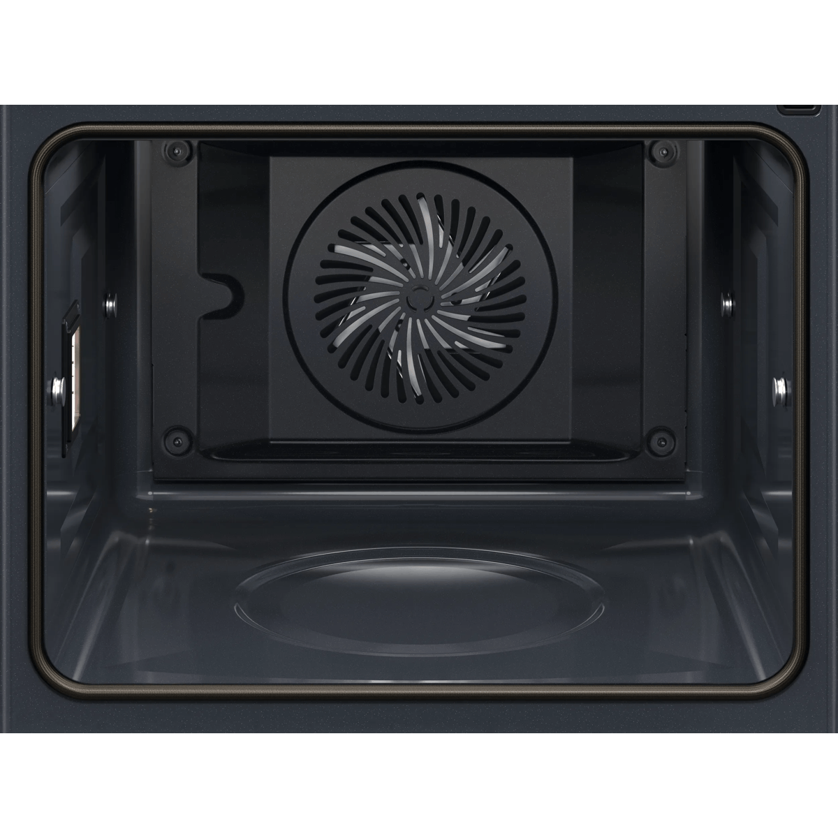 Vista interior de un horno gris oscuro vacío con ventilador trasero circular y base lisa.