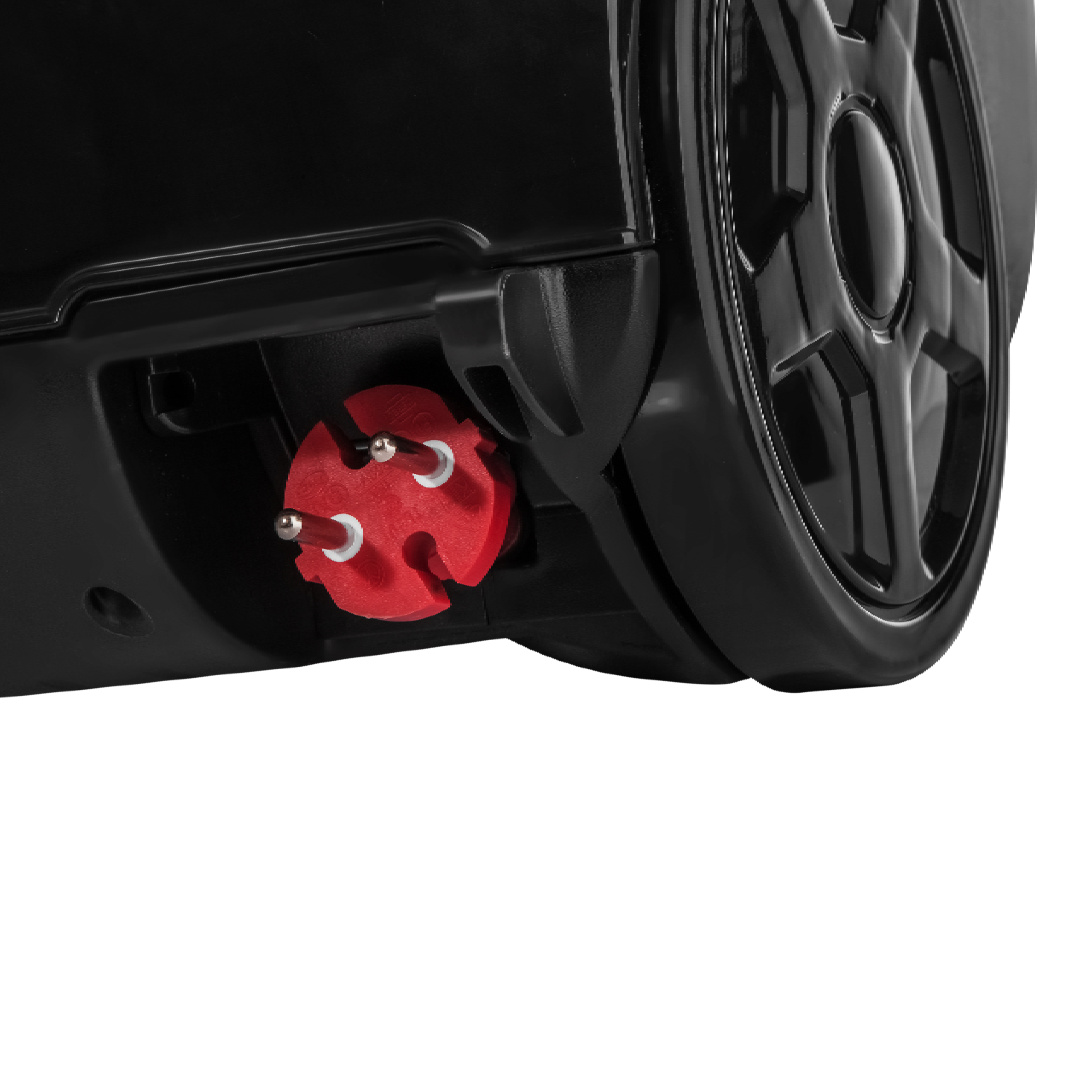 A red plug is inserted into a socket on the black body of the vacuum cleaner.