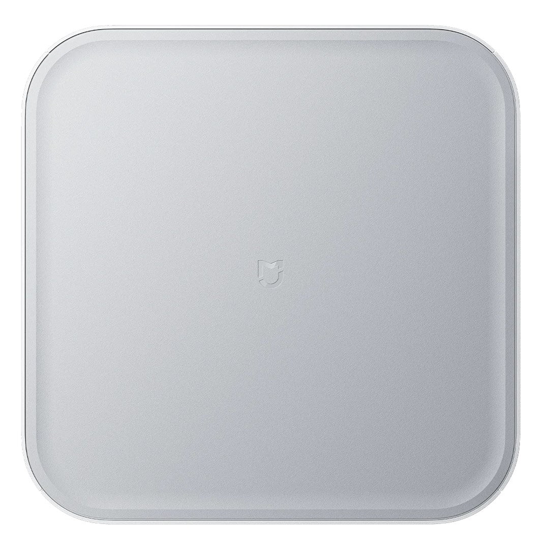 Eine quadratische, weiße Xiaomi-Smart-Waage mit abgerundeten Ecken und einem dezenten Logo in der Mitte.