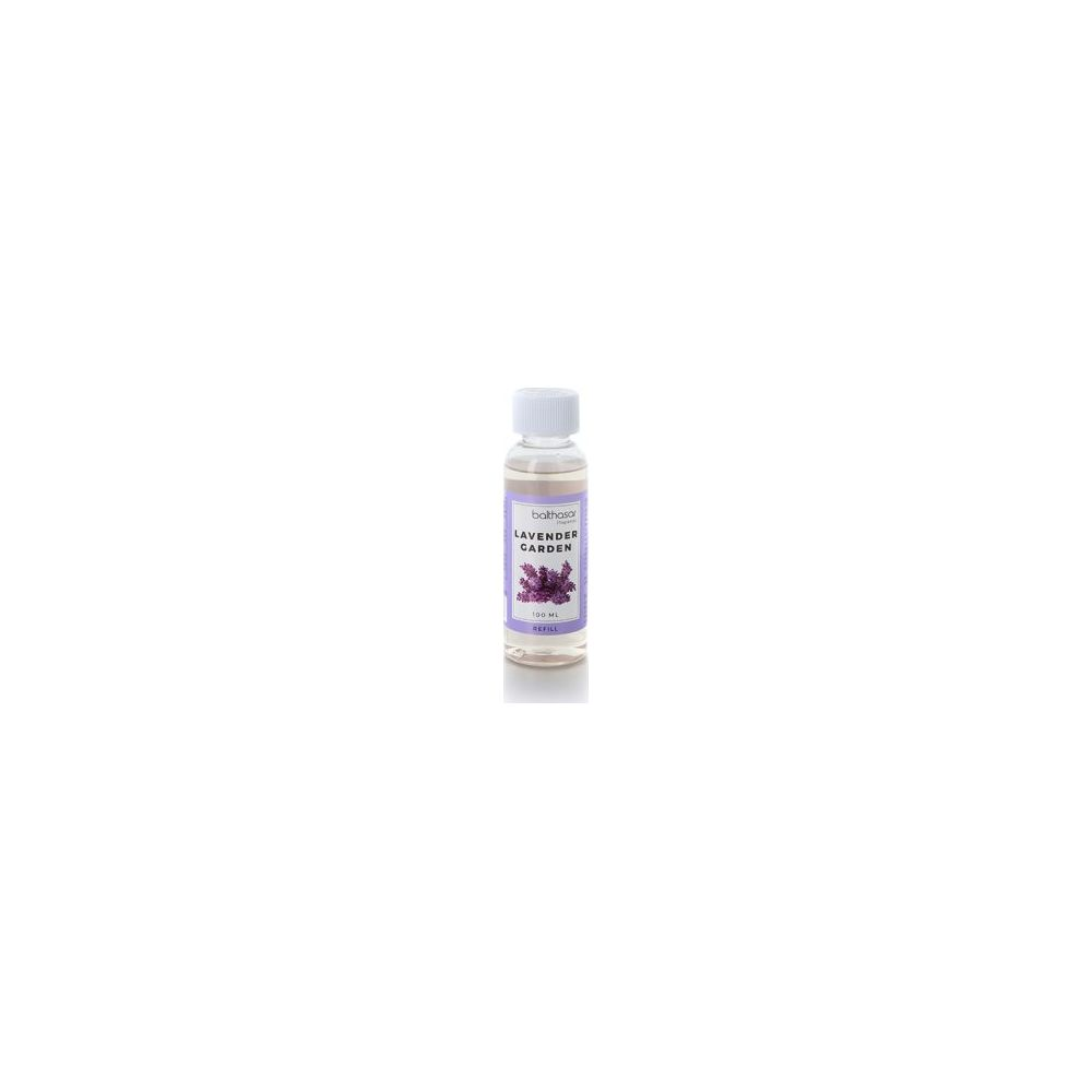 Una piccola bottiglia trasparente di olio profumato con tappo bianco ed etichetta di lavanda.