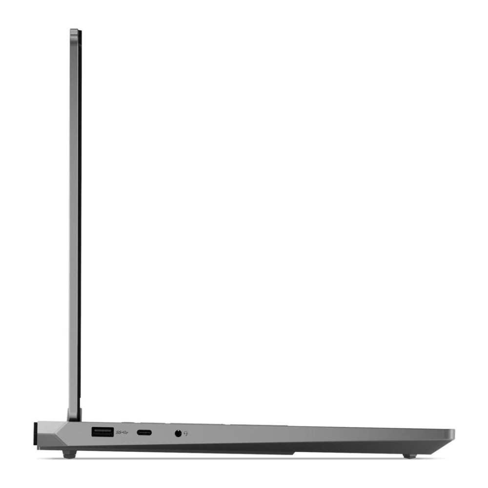 Widok z boku zamkniętego szarego laptopa z portami USB i audio.