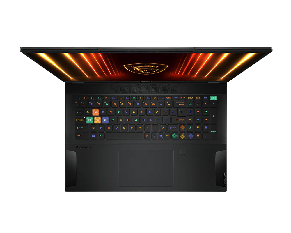 Vista dall'alto di un laptop da gioco aperto con tastiera retroilluminata e logo MSI dorato sullo schermo.