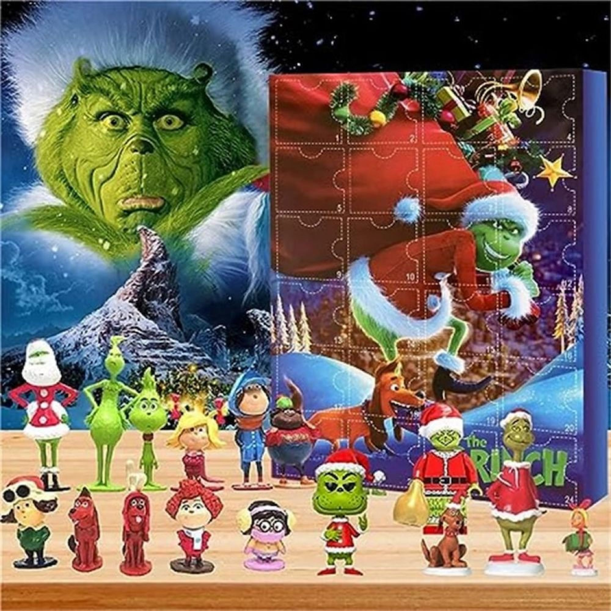Grinch Adventskalender mit großem Grinch-Gesicht links und verschiedenen Grinch-Figuren auf einem Holztisch.
