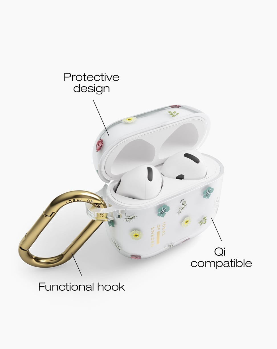Estuche transparente para AirPods con patrón floral, mosquetón dorado y etiquetas de diseño protector y compatibilidad Qi.